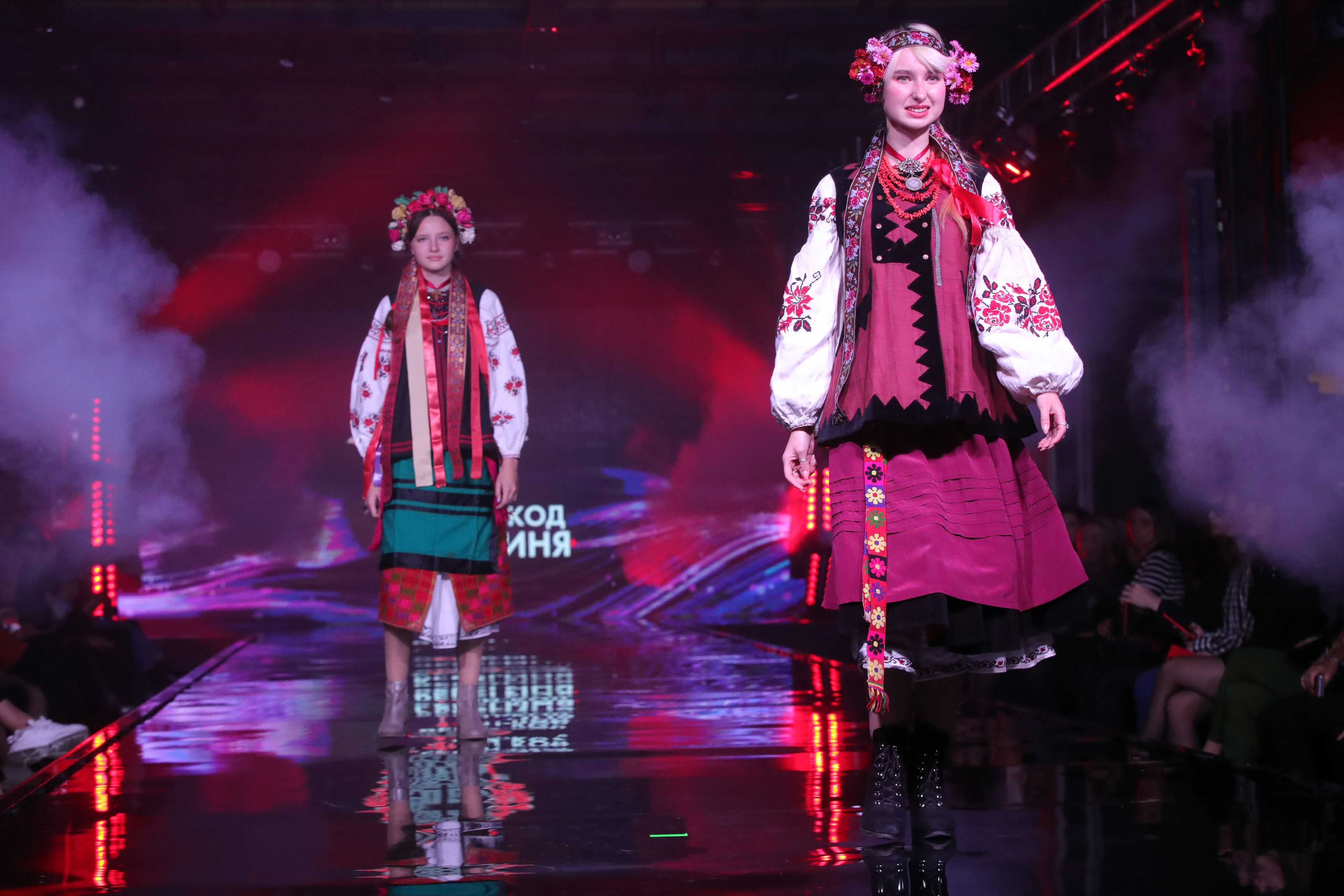 KYIV, UKRAINE - OCTOBER 22, 2021 - Models demonstrate traditional Ukrainian clothes during the Junior Fashion Week at the Kyiv International Convention Center Parkovy, Kyiv, capital of Ukraine. Berehynia collection of Ukrainian costumes at Junior Fashion Week Copyright: xPavlo_Bagmutx 