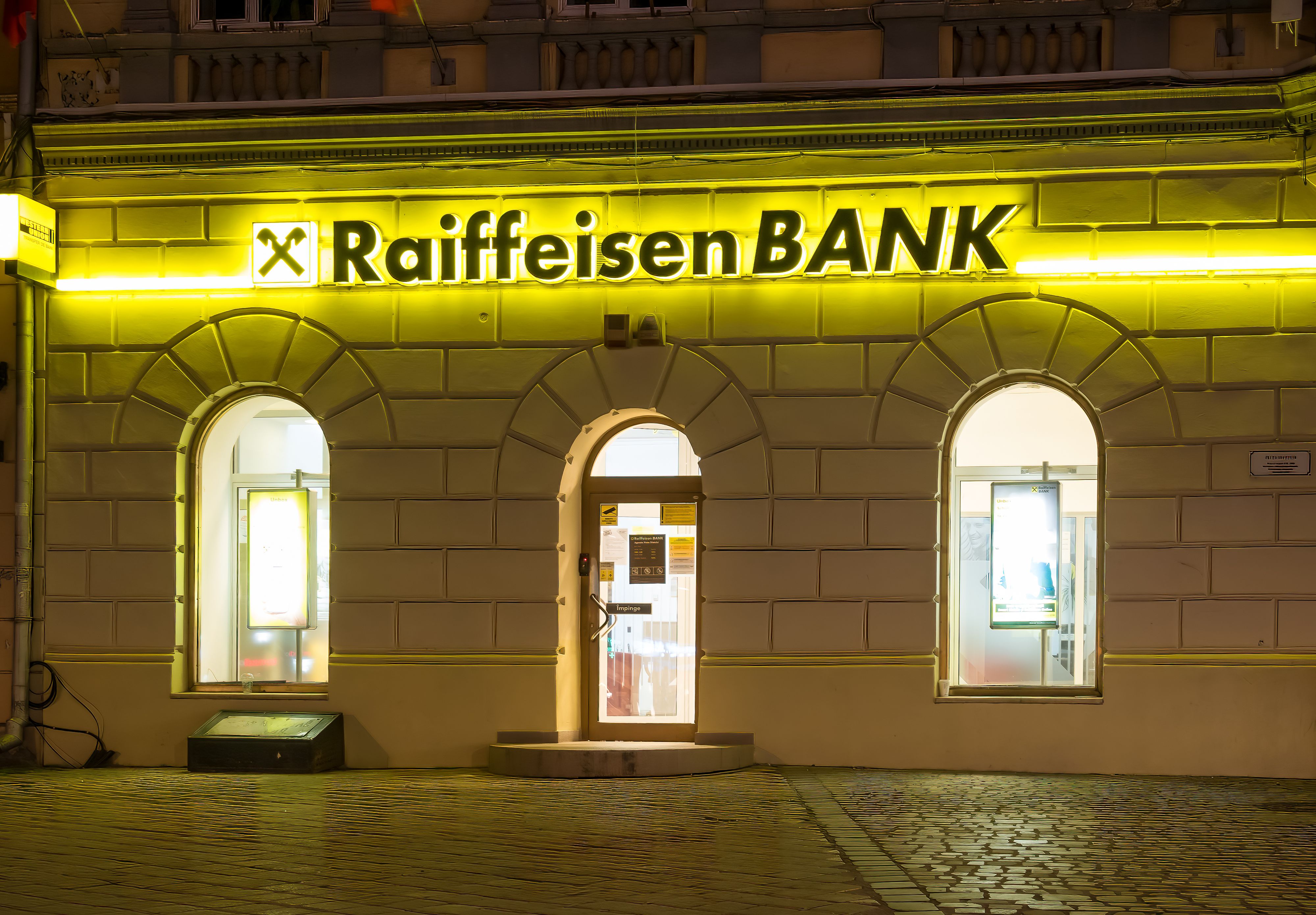Brasov/Romania - 06.28.2020: Raiffeisen bank branch in the old town of Brasov, Council Square.