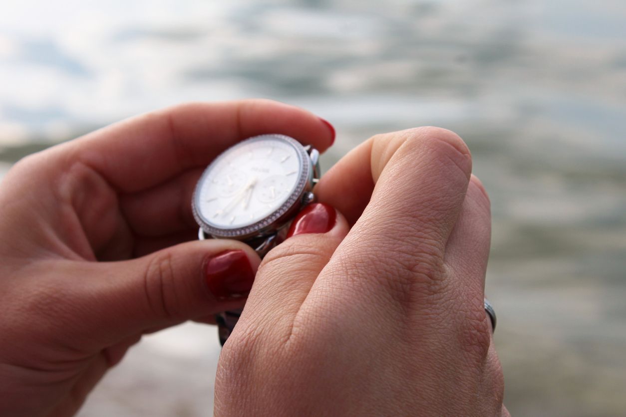 Female hands and swatch.