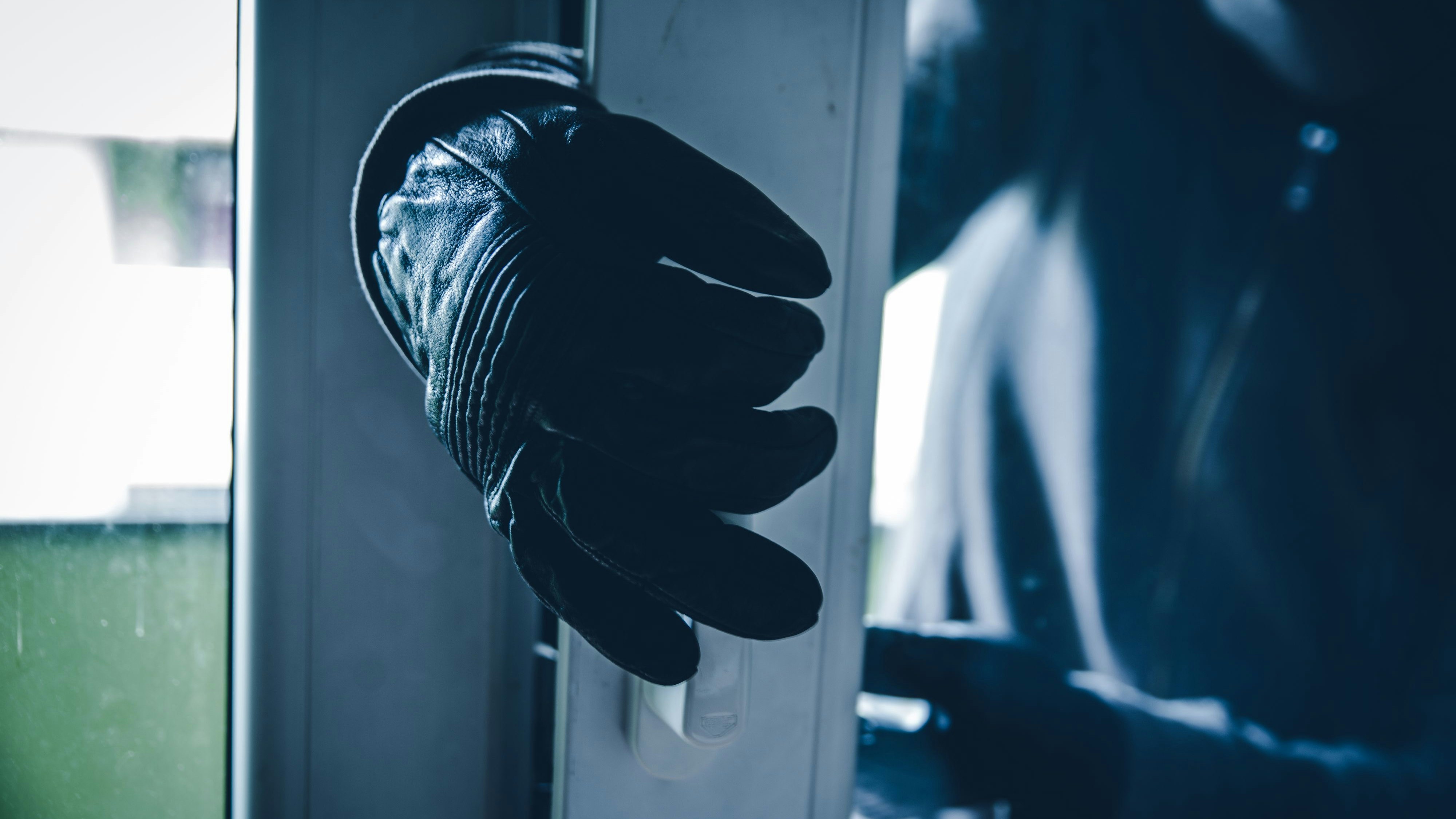 Burglar Breaking Into House