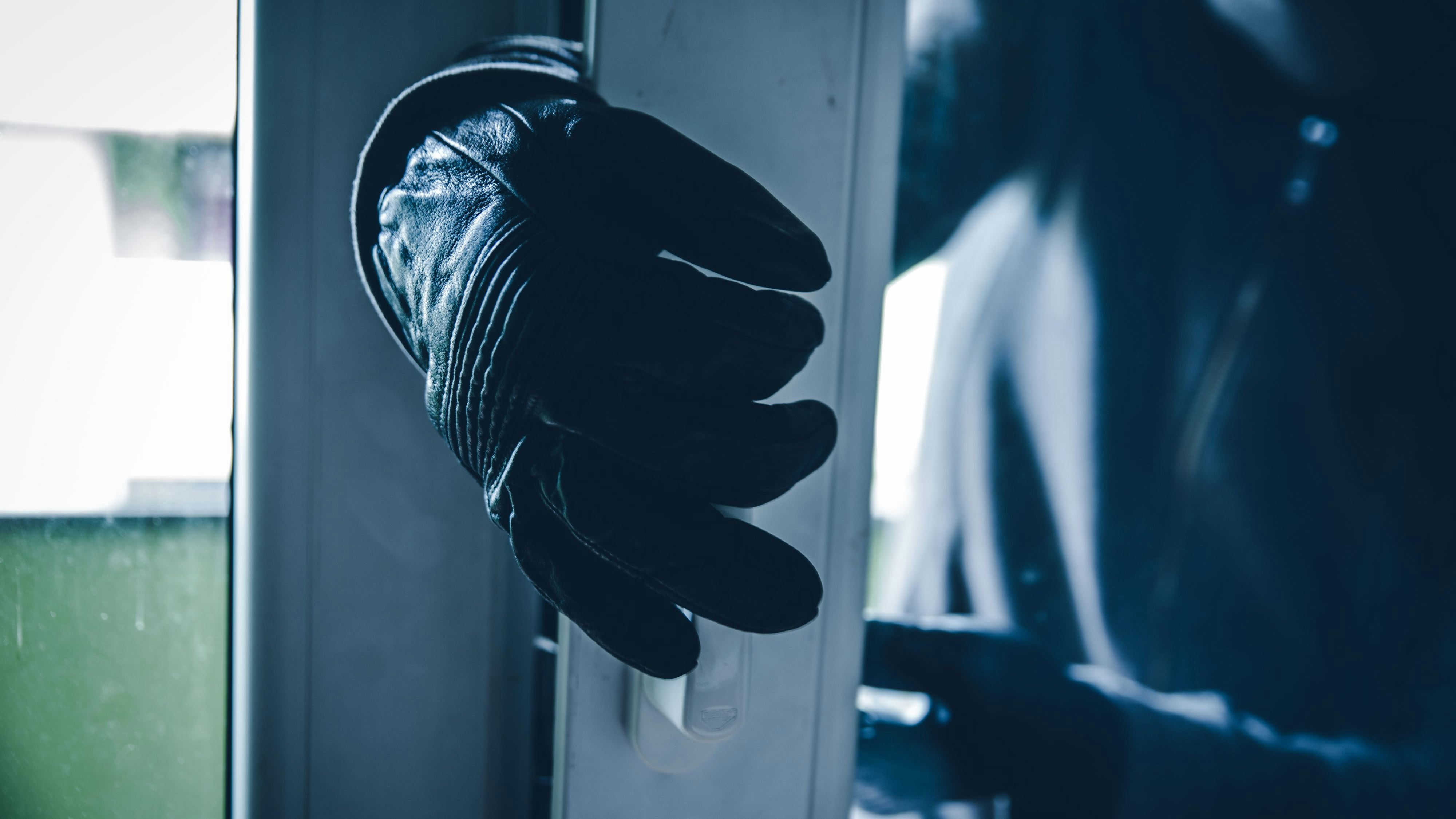 Burglar Breaking Into House