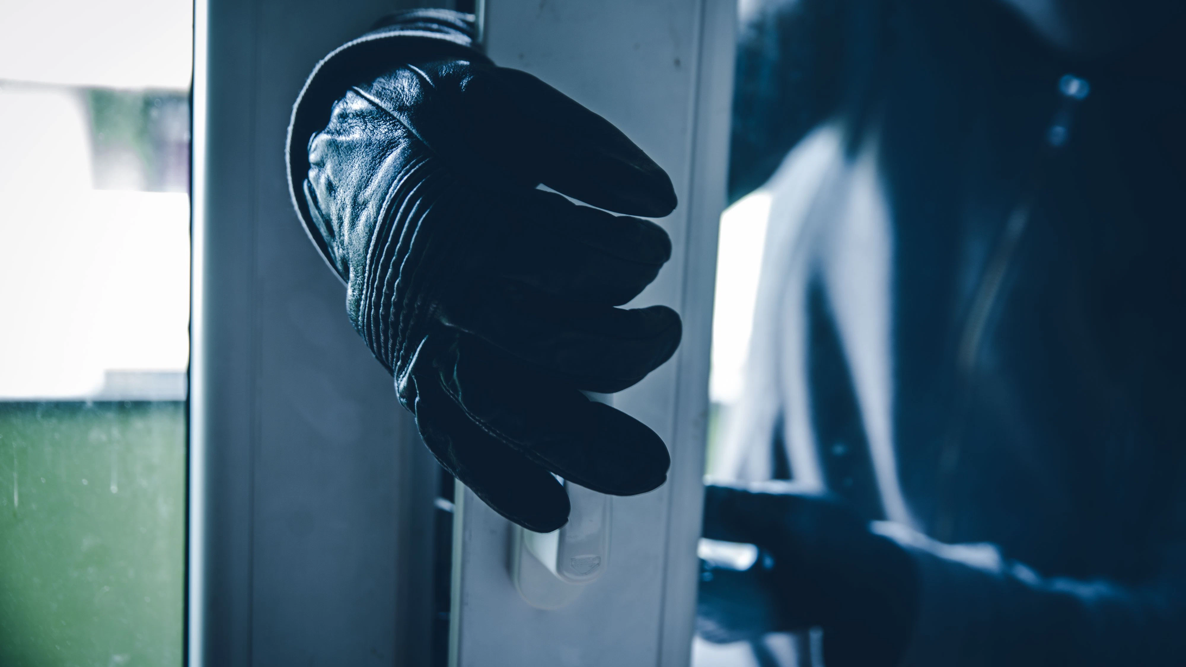 Burglar Breaking Into House