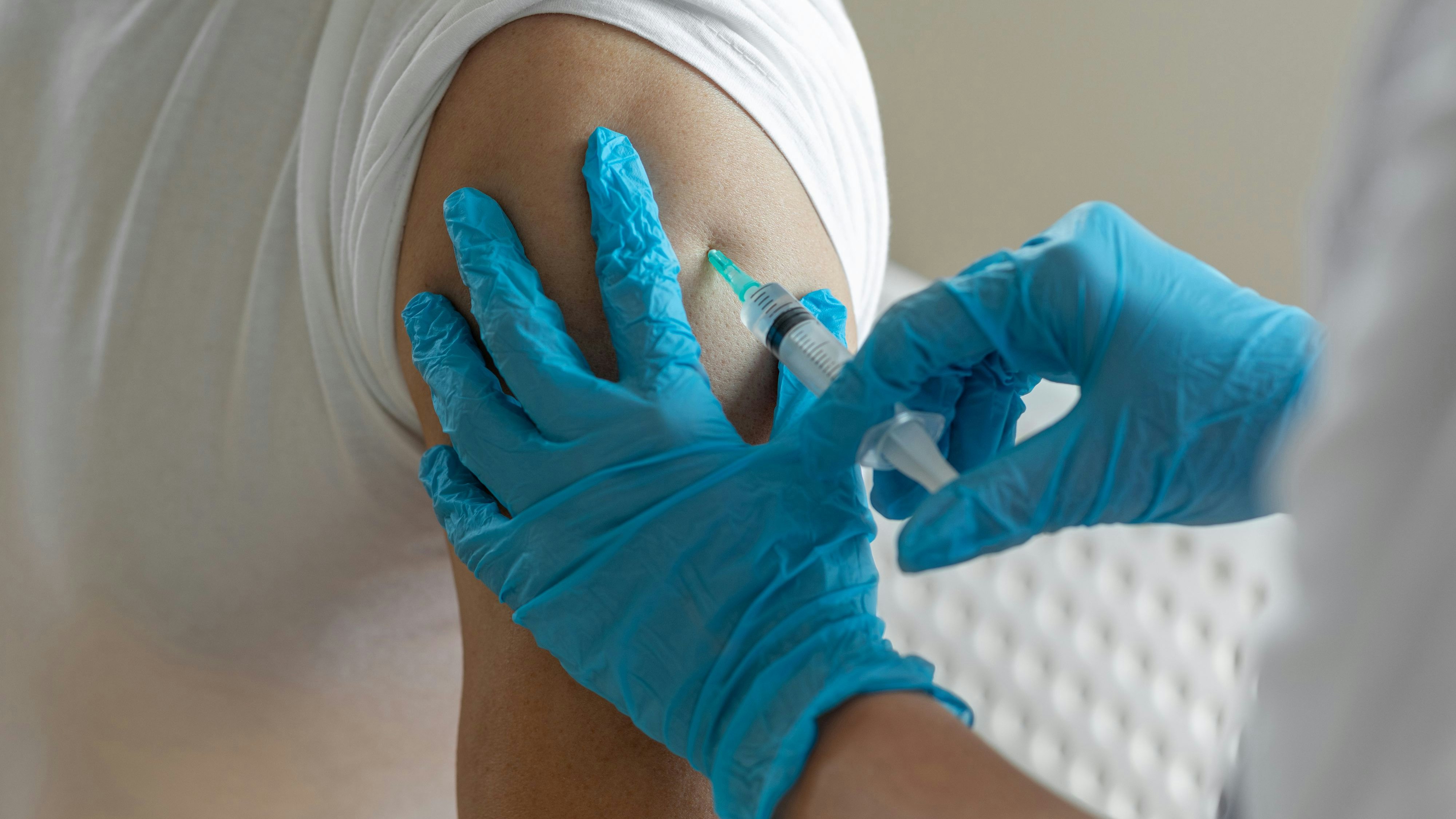 Doctor`s hands making injection