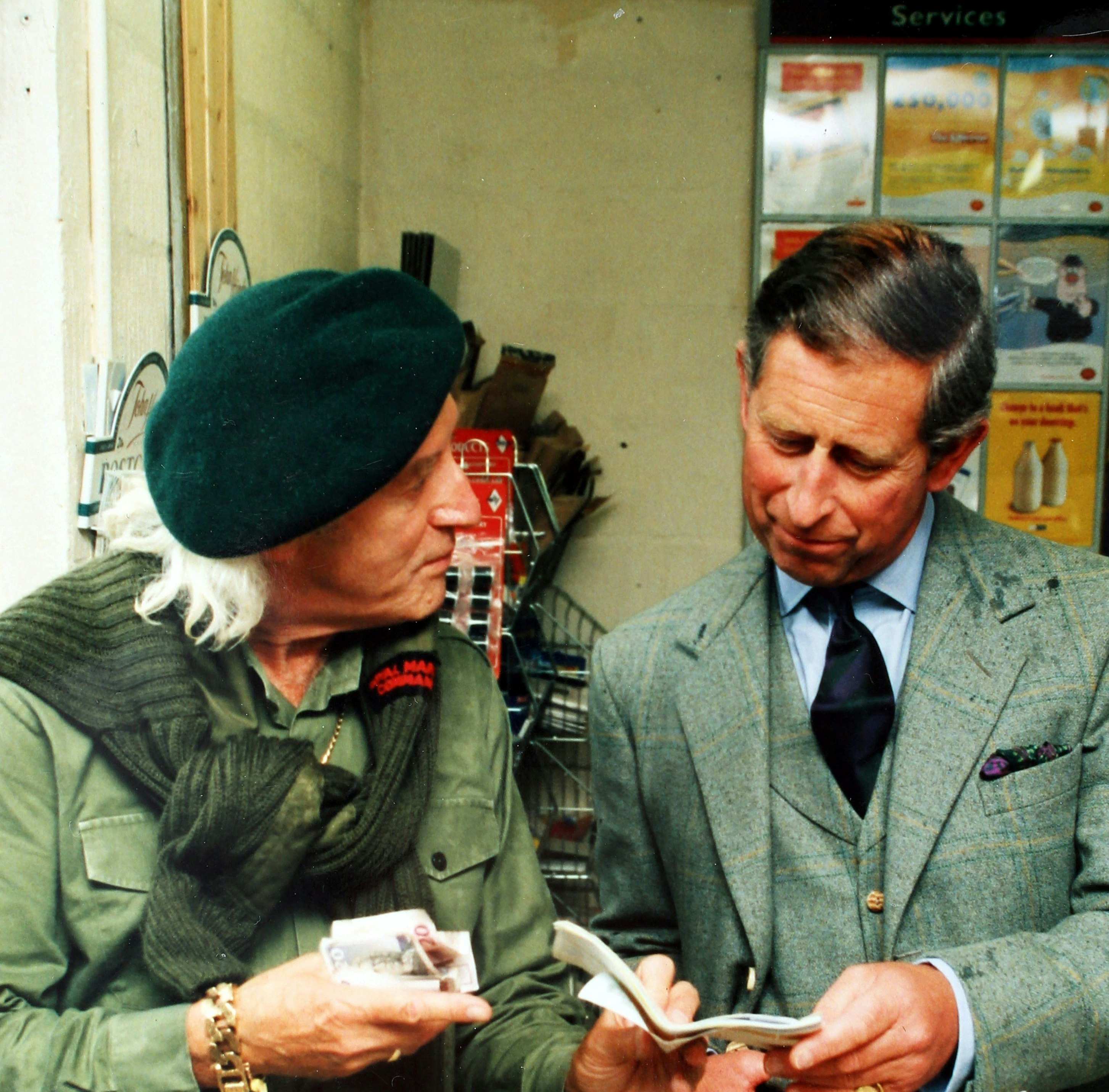 Jimmy Savile mit Prinz Charles im Jahre 1999.