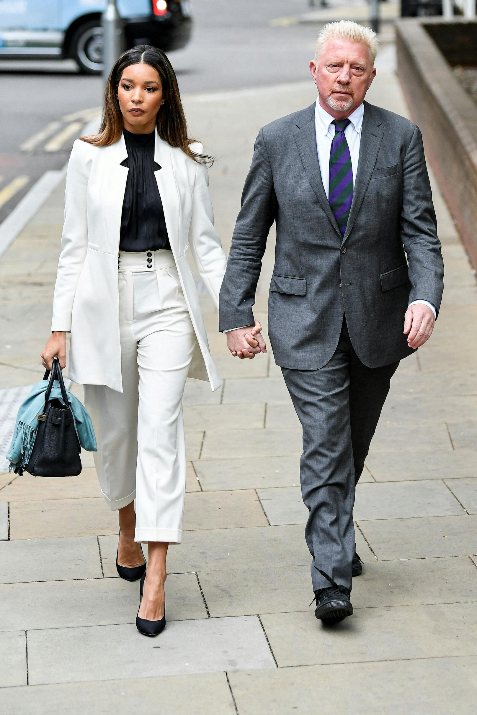 Boris Becker mit seiner Partnerin Lilian auf dem Weg ins Gericht.