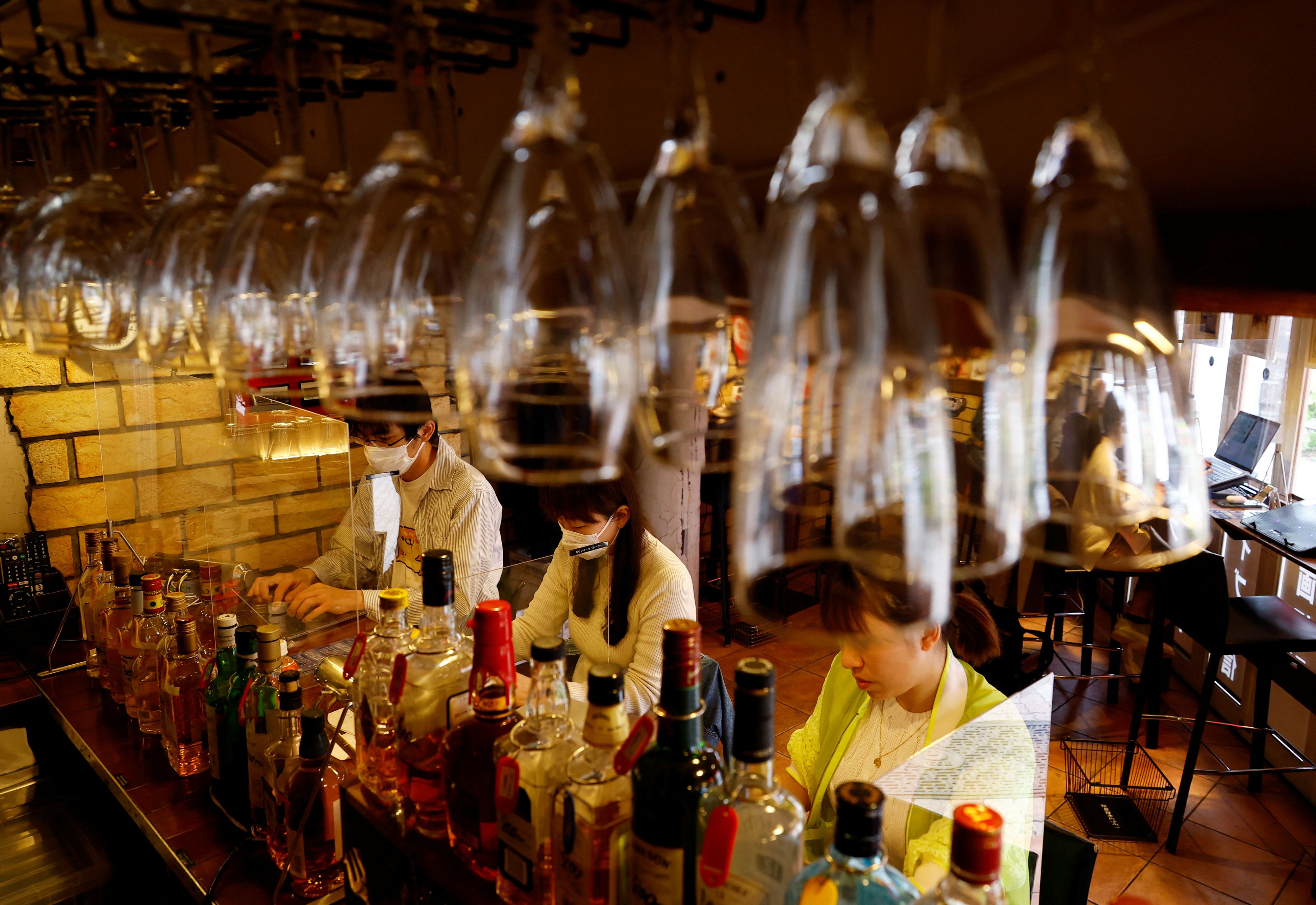 Customers work on their manuscripts at the Manuscript Writing Cafe, which is designed for writers who are working on a deadline, in Tokyo, Japan, April 21, 2022. Picture taken on April 21, 2022. REUTERS/Kim Kyung-Hoon