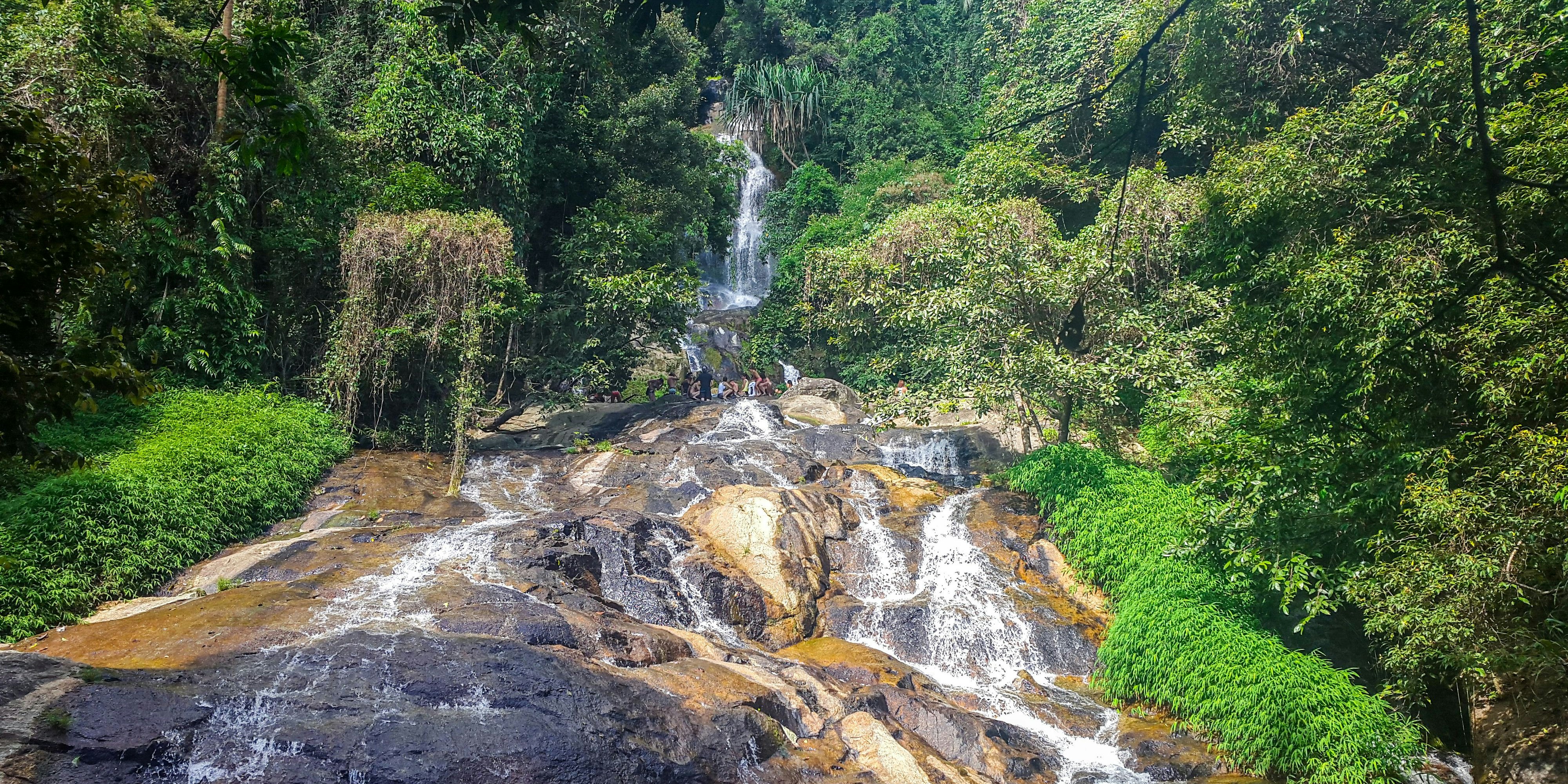 In December 2015, tourists were visiting the Namtok Na Mueang Waterfalls in Koh Samui in Thailand.