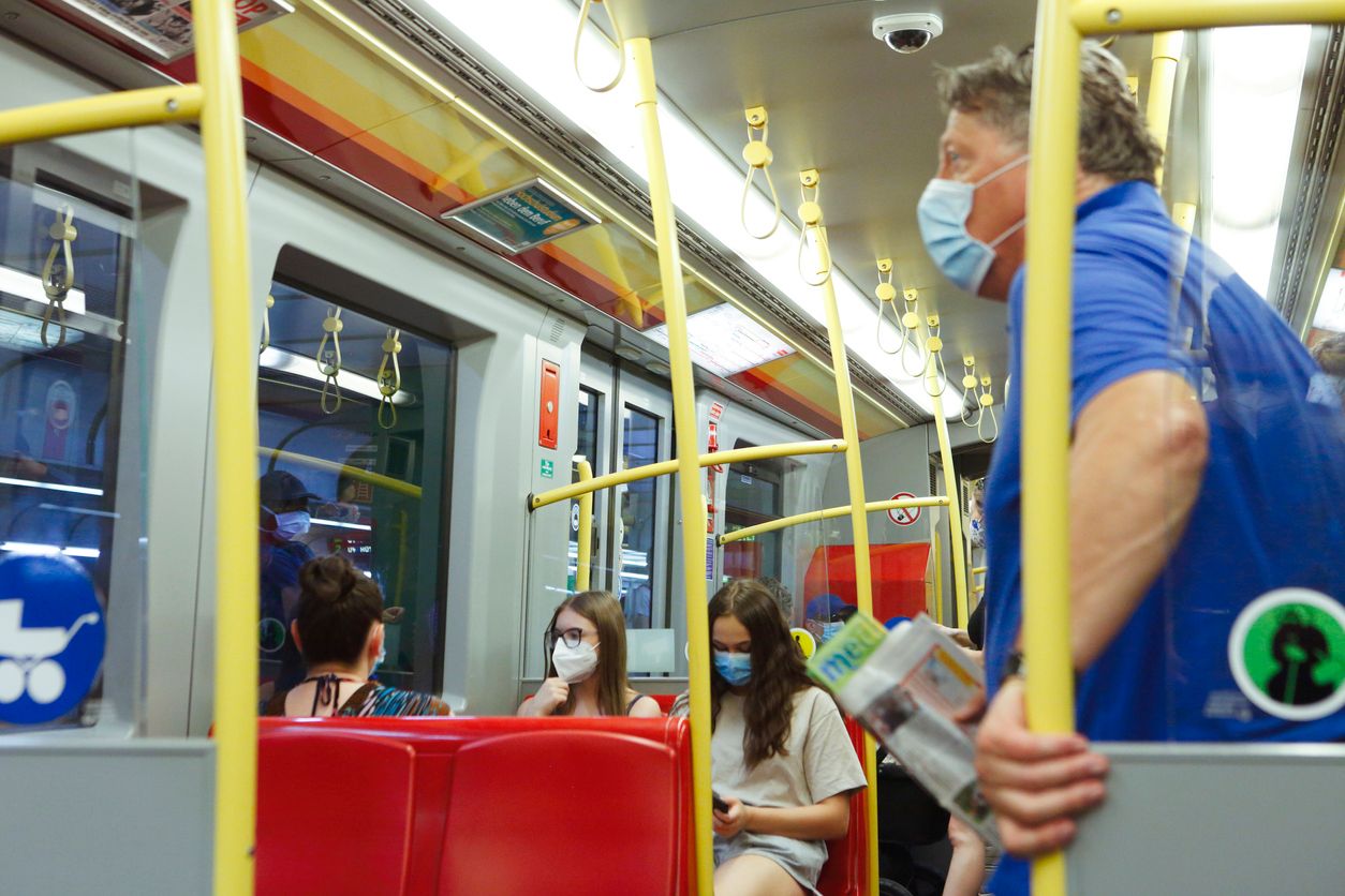 Vienna, Austria - Jul 30, 2020: Passengers with face mask travelling in subway. Face mask protection is mandatory in public transport at this time due to the covid19 pandemic.