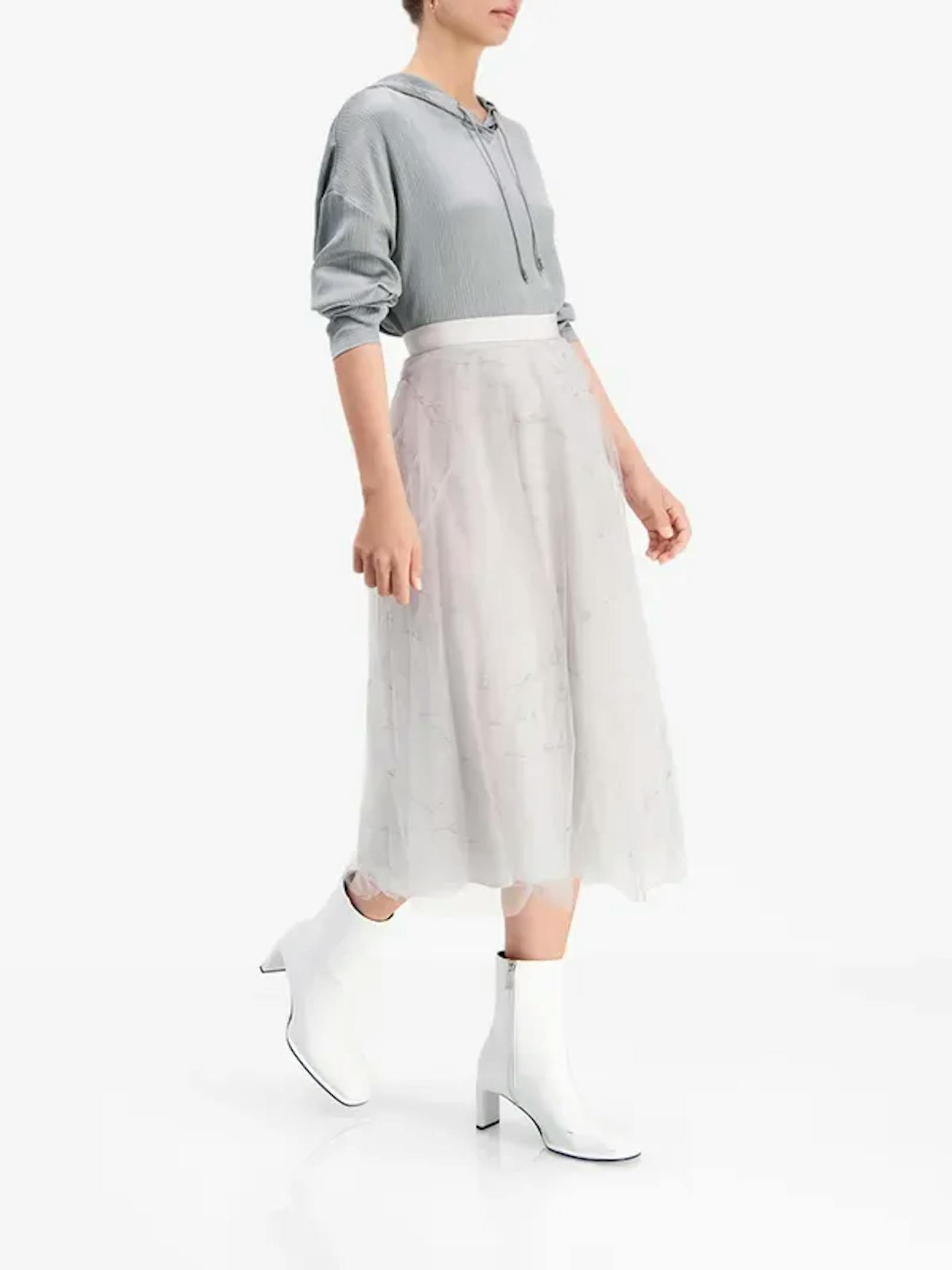 Ganz wie Carrie Bradshaw siehst du mit diesem Taillenrock aus Tüll wie eine Modeikone aus.