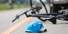 Auf Straße geworfener Helm rettet Radfahrerin
