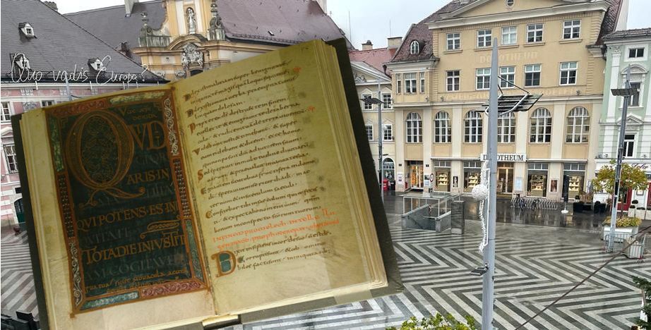 Symbolfoto einer wertvollen Faksimile und das Dorotheum, wo die Frau aufgeklärt wurde im Hintergrund.