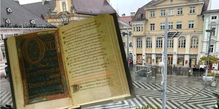 Symbolfoto einer wertvollen Faksimile und das Dorotheum, wo die Frau aufgeklärt wurde im Hintergrund.
