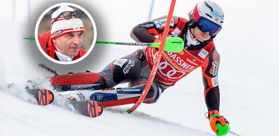 Henrik Kristoffersen schnallt sich die Ski von Marcel Hirscher an. 