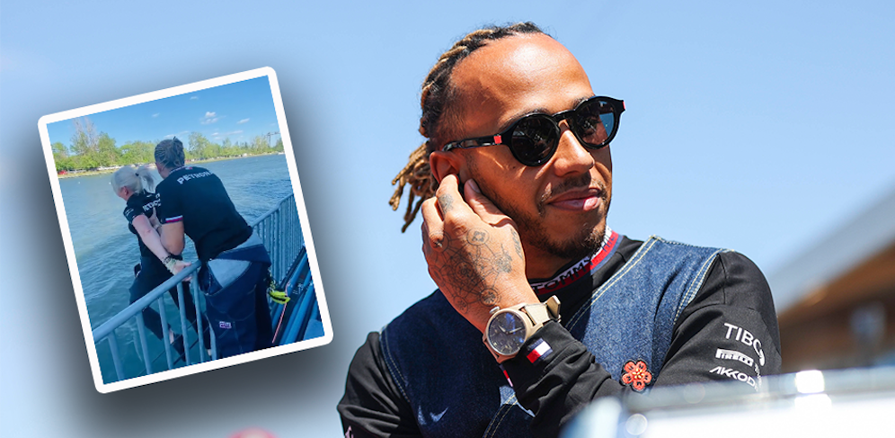Lewis Hamilton schubst seine Betreuerin ins kühle Nass. 