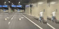 Abkürzung? Mann cruist mit Fahrrad durch Autobahntunnel