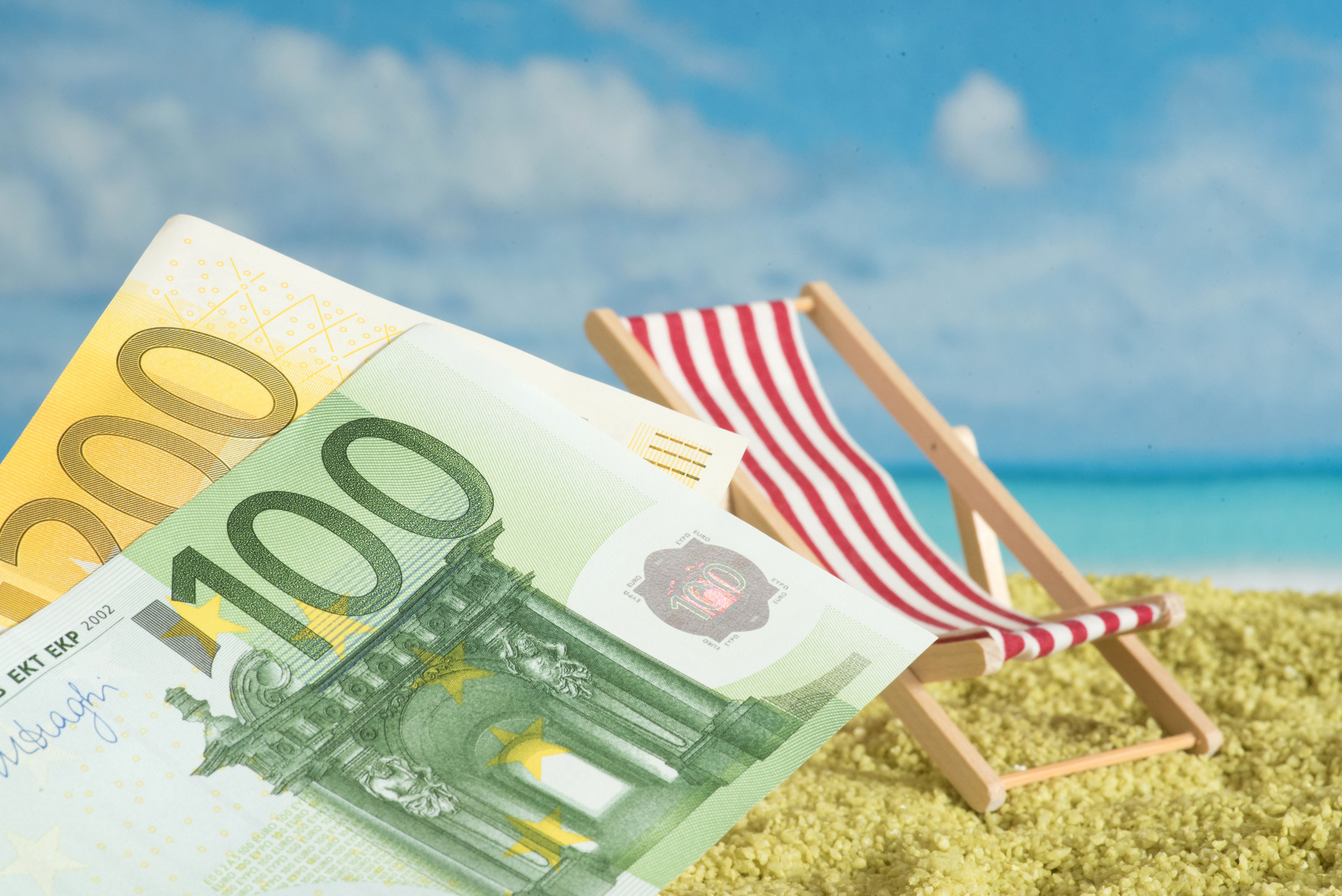 Beach, holidays and Euro banknotes
