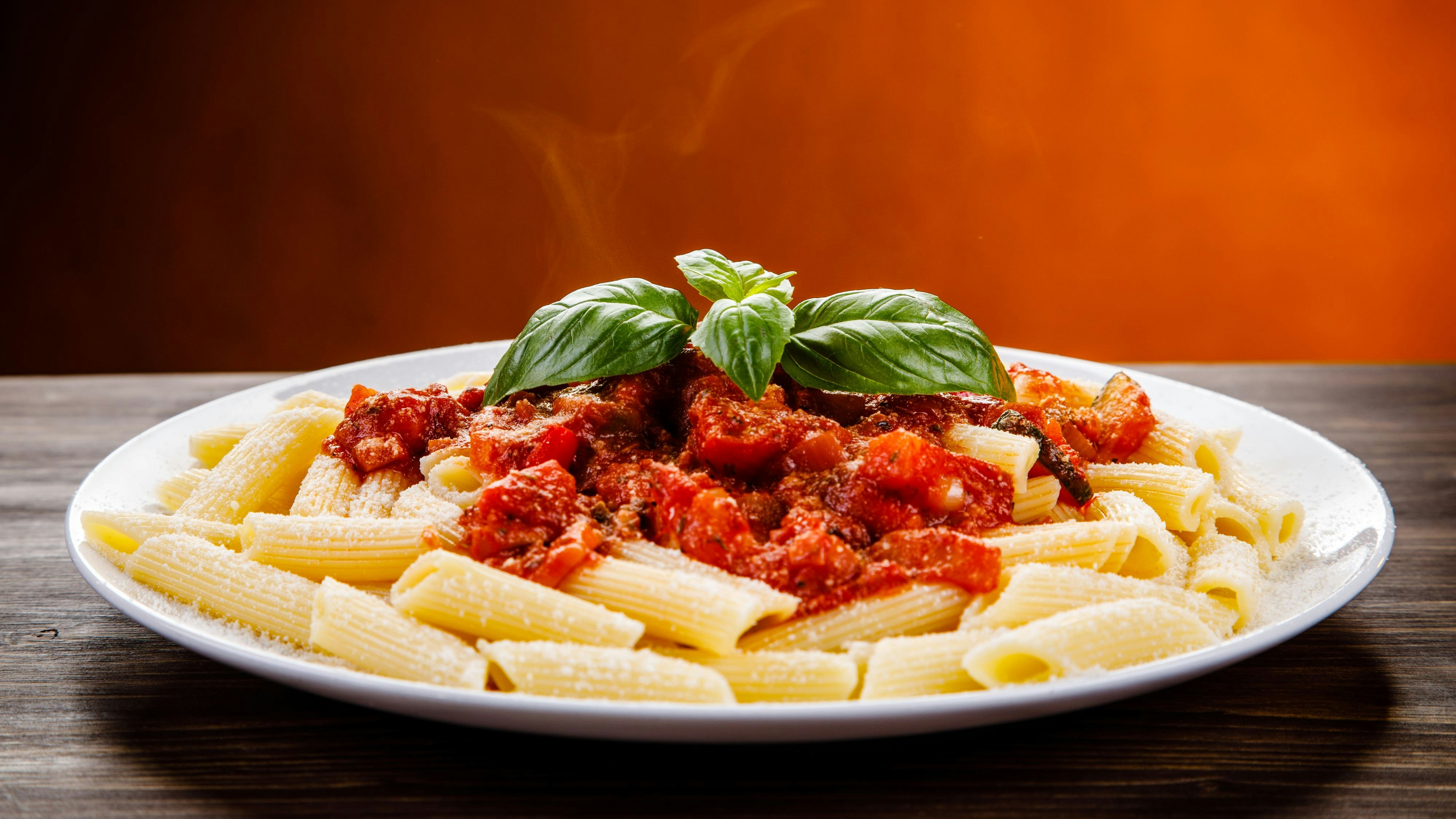 Penne with tomato sauce and pork