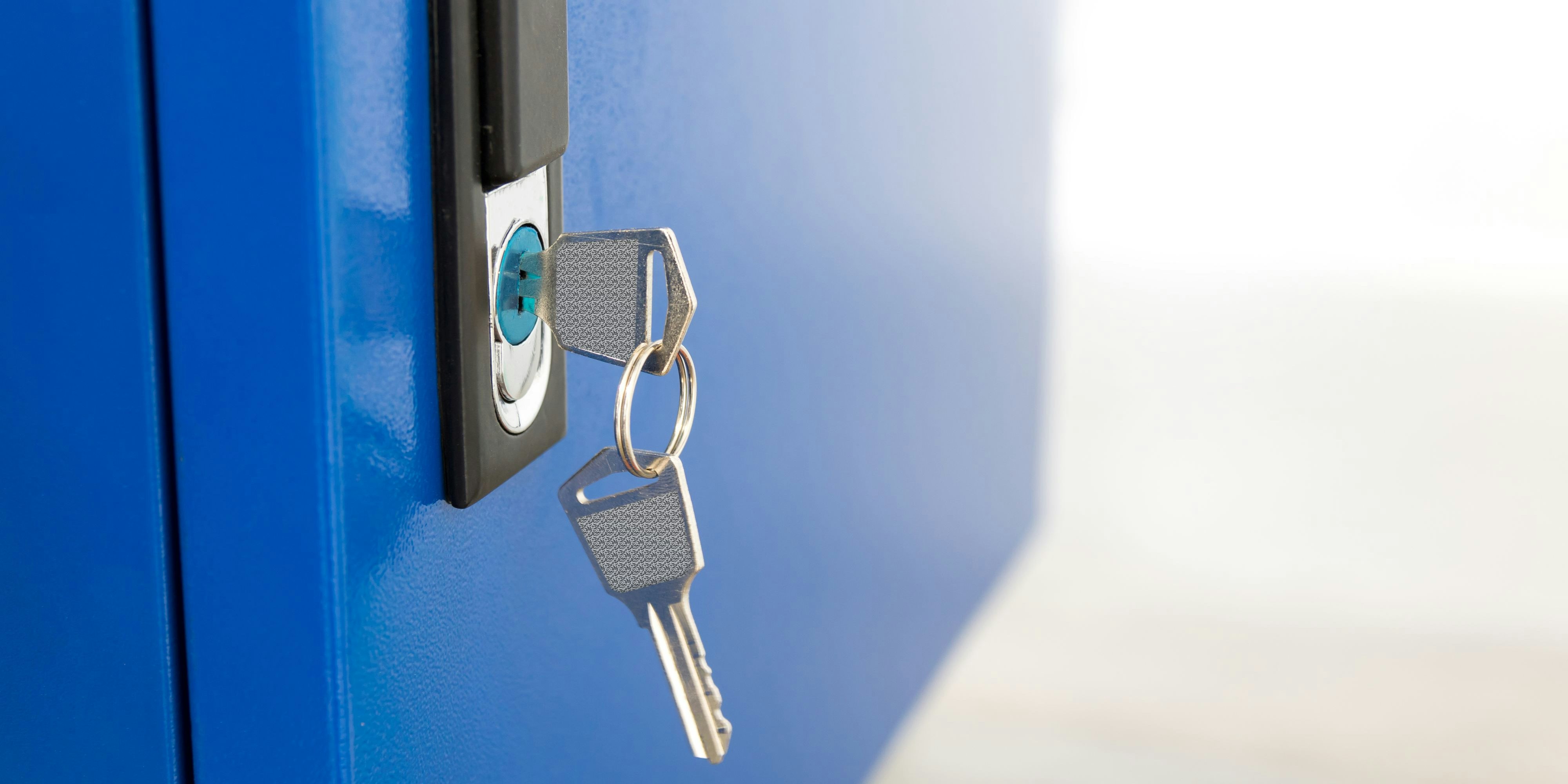 Blue locker and key chain in school gym