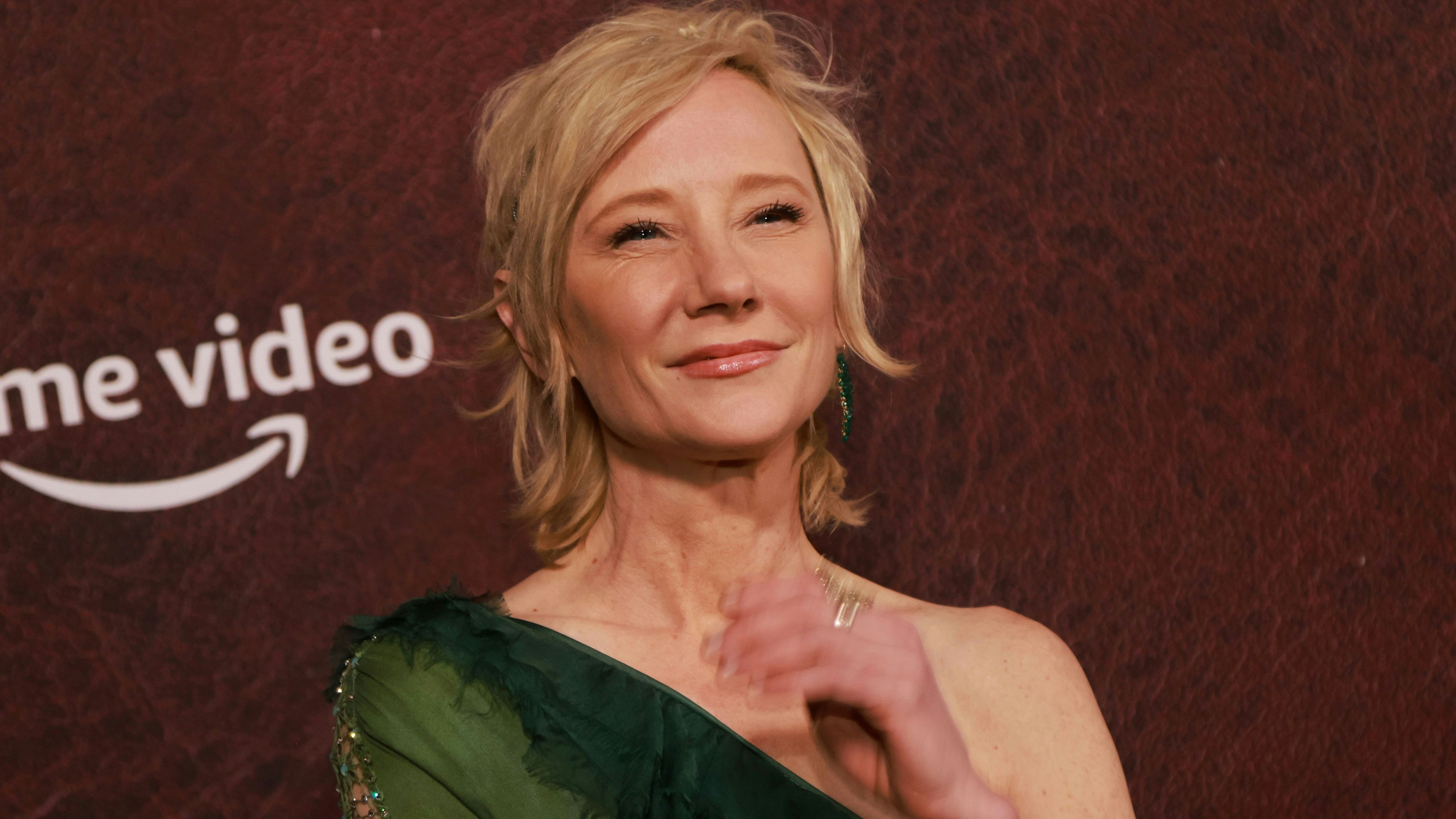 Anne Heche attends the premiere for the film "The Tender Bar" at The TLC Chinese Theater in Los Angeles, California, U.S., December 12, 2021. REUTERS/Aude Guerrucci