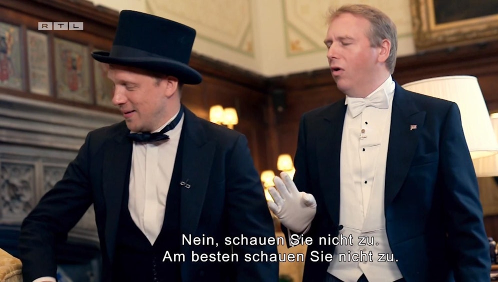 Pocher und der Butler der Royals.