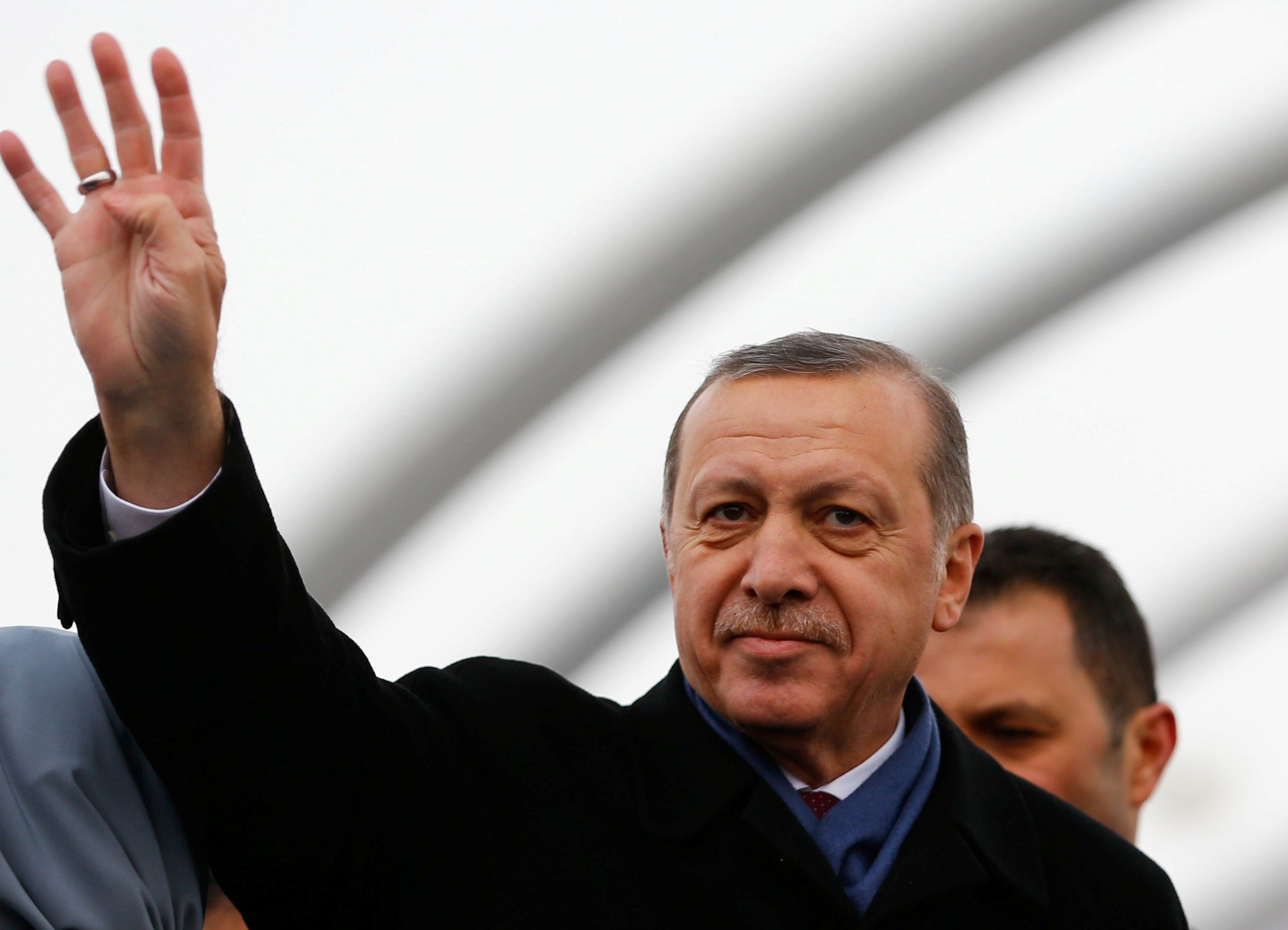 Turkish President Tayyip Erdogan greets people during the opening ceremony of Eurasia Tunnel in Istanbul, Turkey, December 20, 2016. REUTERS/Murad Sezer