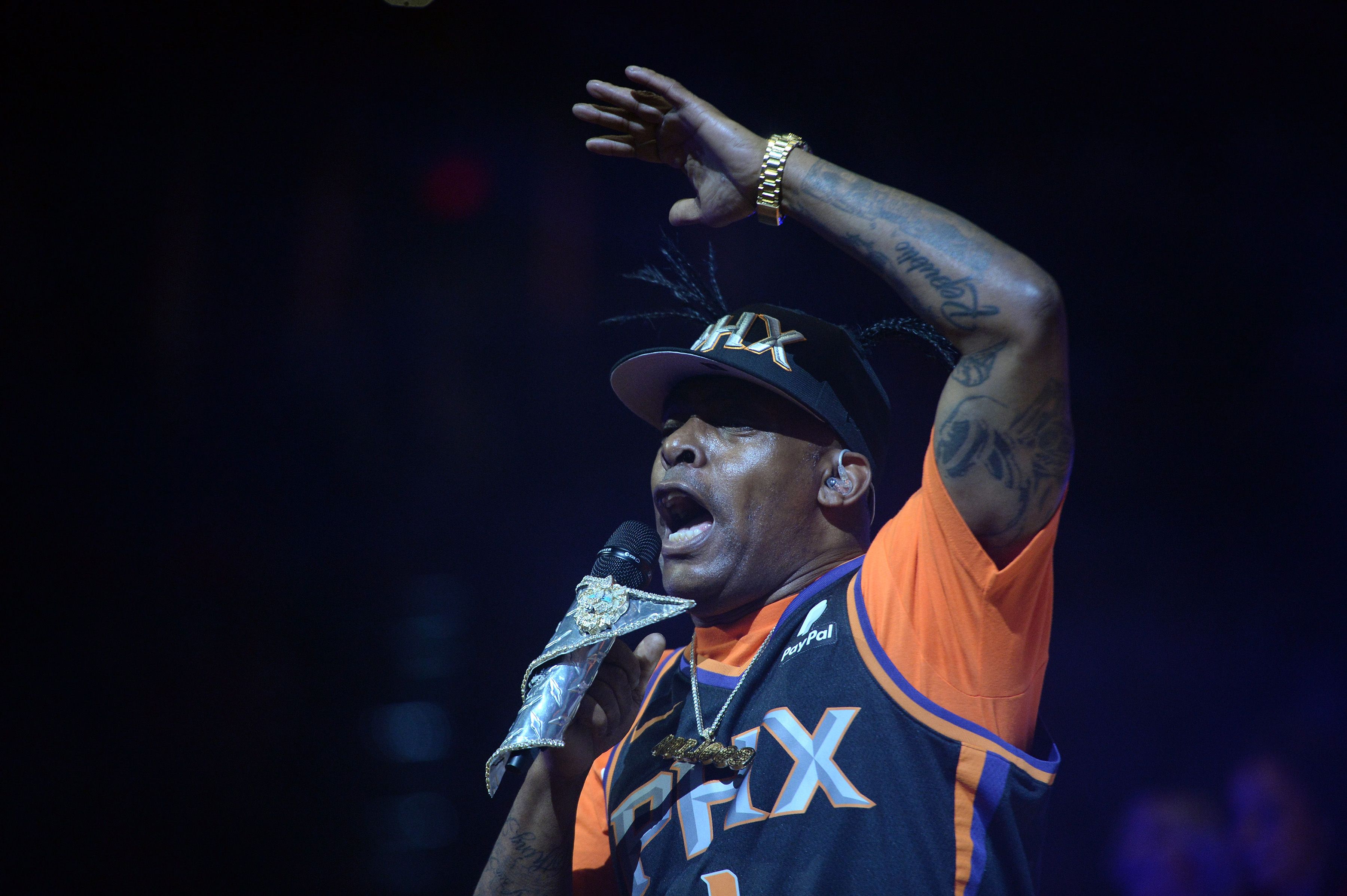 Apr 5, 2019; Phoenix, AZ, USA; Recording artist Coolio performs during halftime of the game between the Phoenix Suns and the New Orleans Pelicans at Talking Stick Resort Arena. Mandatory Credit: Joe Camporeale-USA TODAY Sports