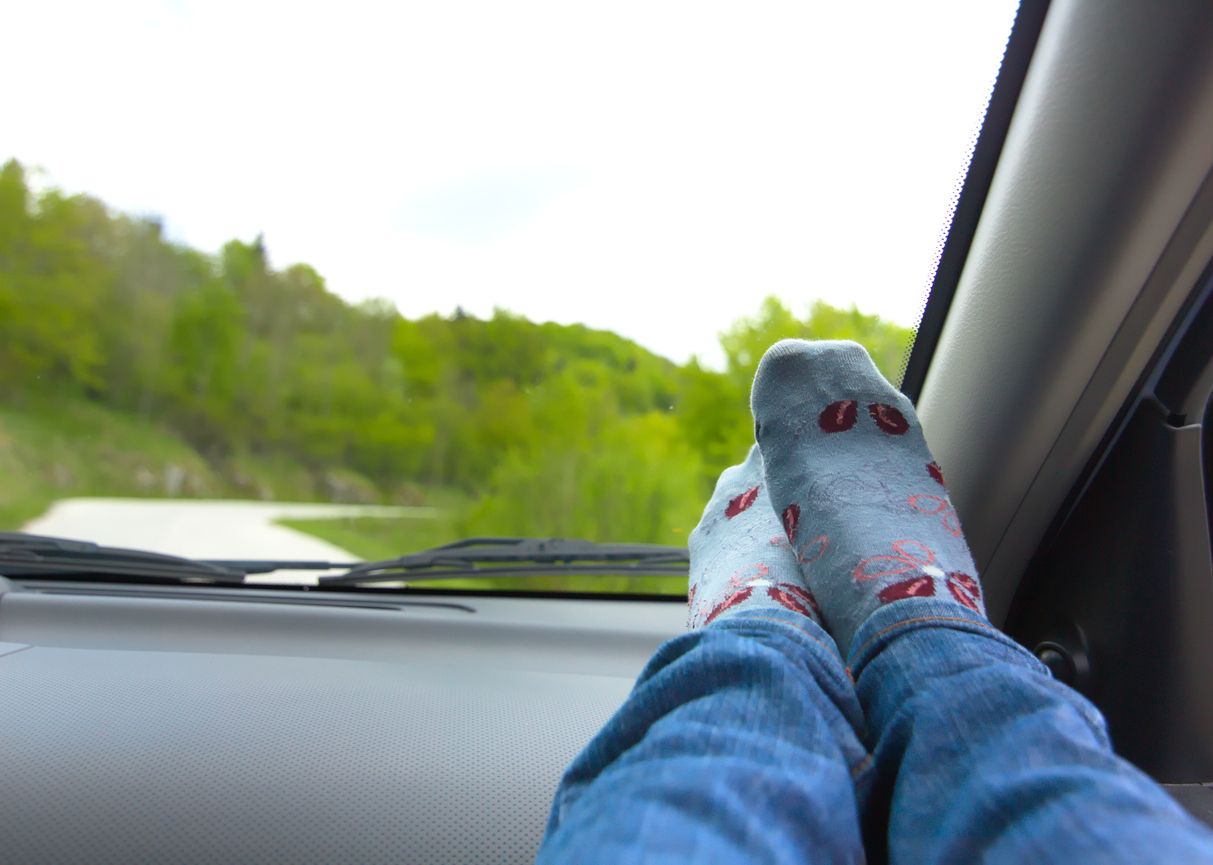 Personal View of Woman Legs Car