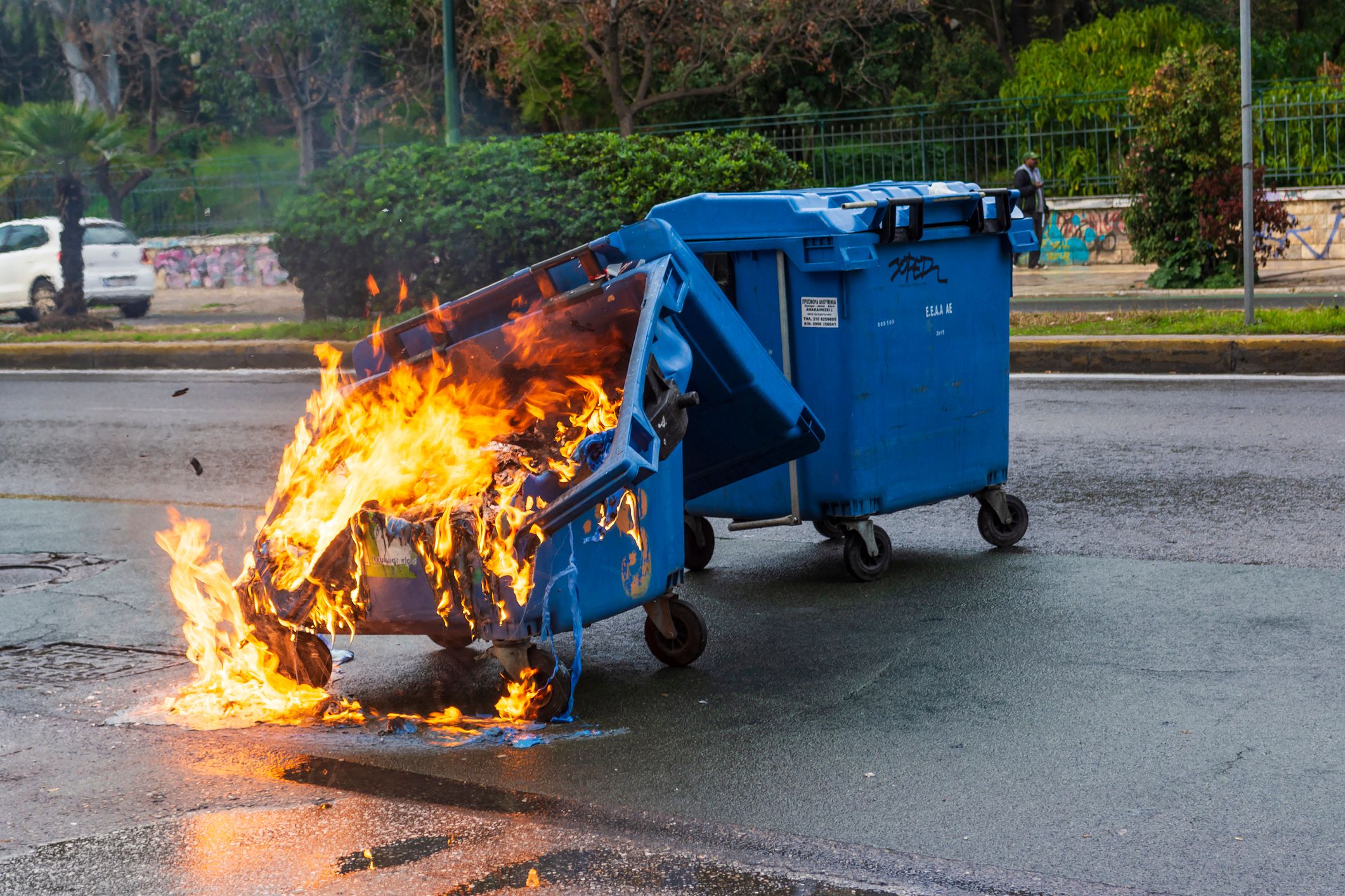 Athens, Greece - January 20, 2019: Burnt and melted trash bin from fire in the city of Athens after a demonstration event.