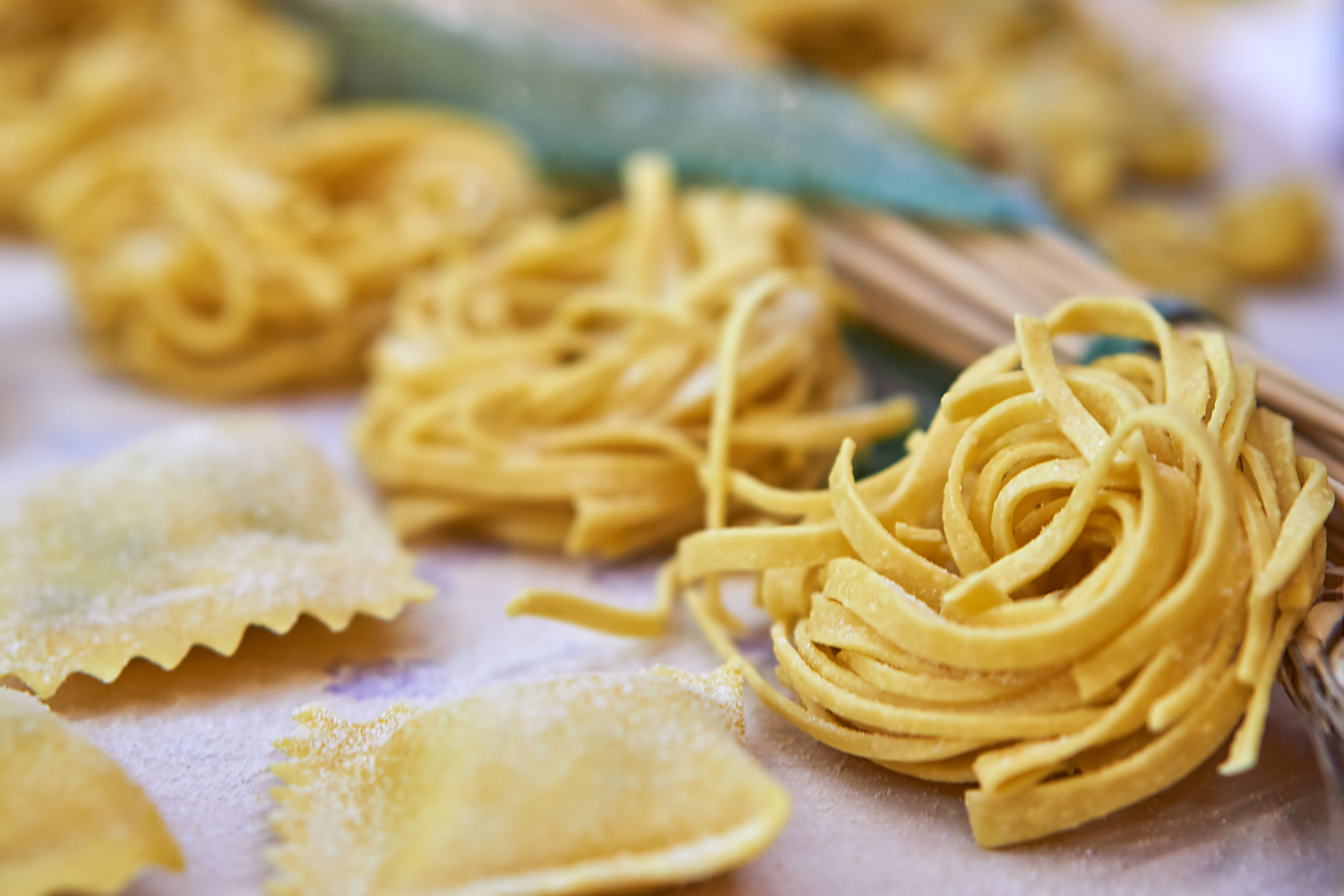 different pasta are drying on the table