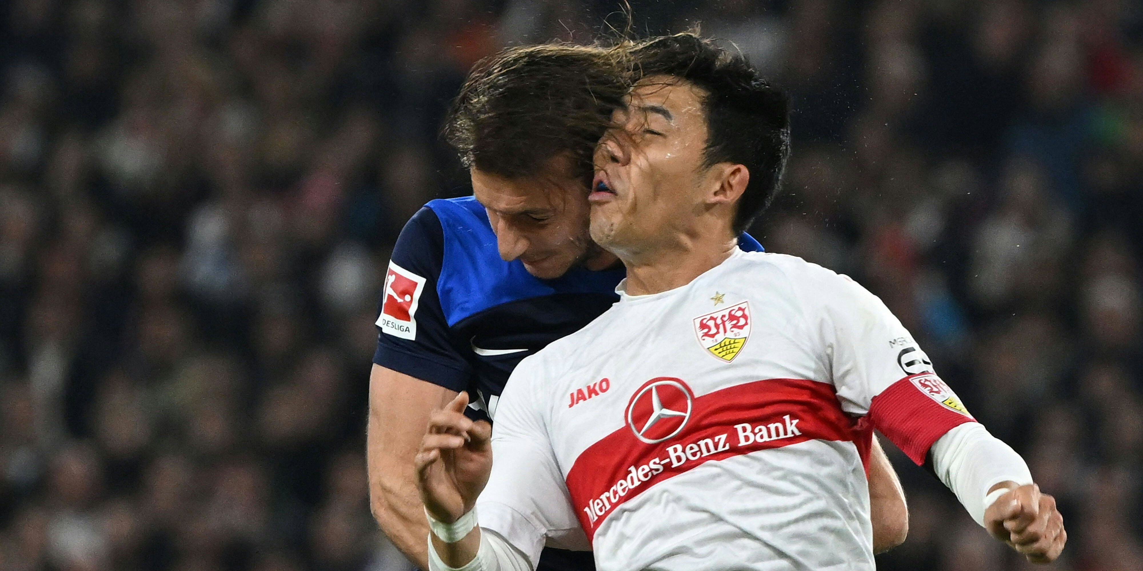 Schmerzhaftes Luftduell: Ivan Sunjic (l.) gegen Wataru Endo