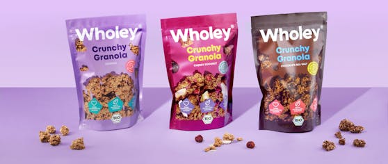 Wir verlosen Frühstückpakete von WHOLEY inklusive drei Crunchy Granola Sorten Original, Cherry Coconut und Chocolate Sea Salt.