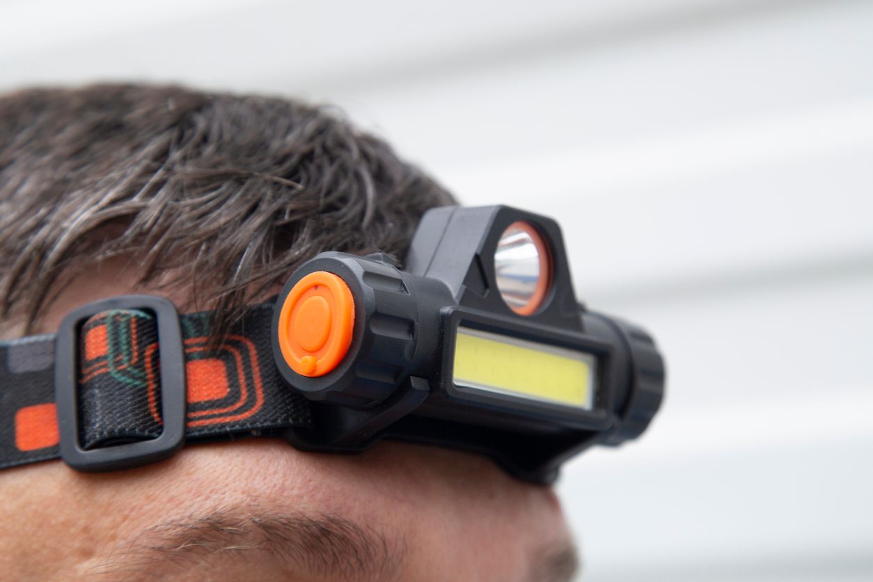 LED flashlight for wearing on the head. The lighting device is self-contained for different uses.