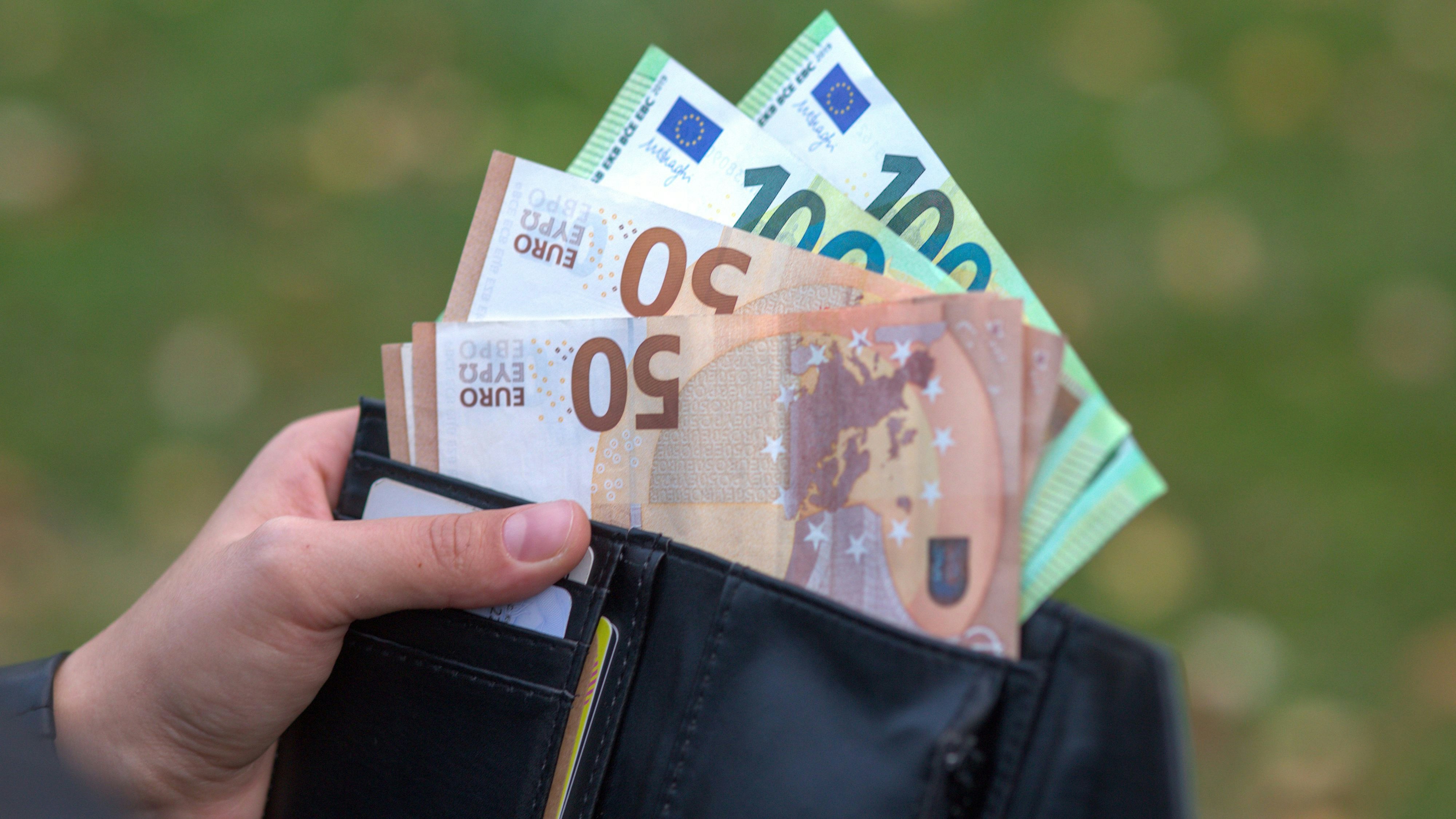 Women's wallet with euro bills