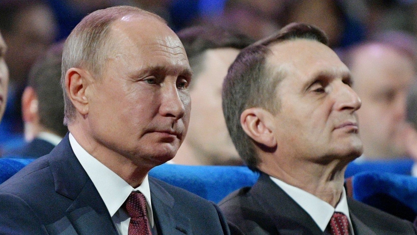 Russian President Vladimir Putin, accompanied by Foreign Intelligence Service (SVR) Director Sergei Naryshkin and Federal Security Service (FSB) Director Alexander Bortnikov, watches a gala on the eve of the day of security service staff in Moscow, Russia December 19, 2019.  Sputnik/Alexei Druzhinin/Kremlin via REUTERS ATTENTION EDITORS - THIS IMAGE WAS PROVIDED BY A THIRD PARTY.