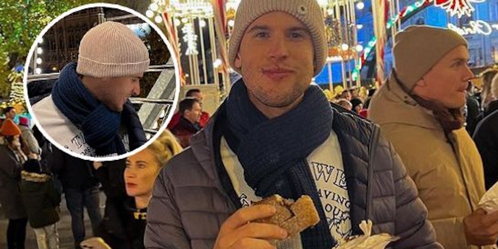 Dominic Thiem lässt sich's am Christkindlmarkt schmecken.