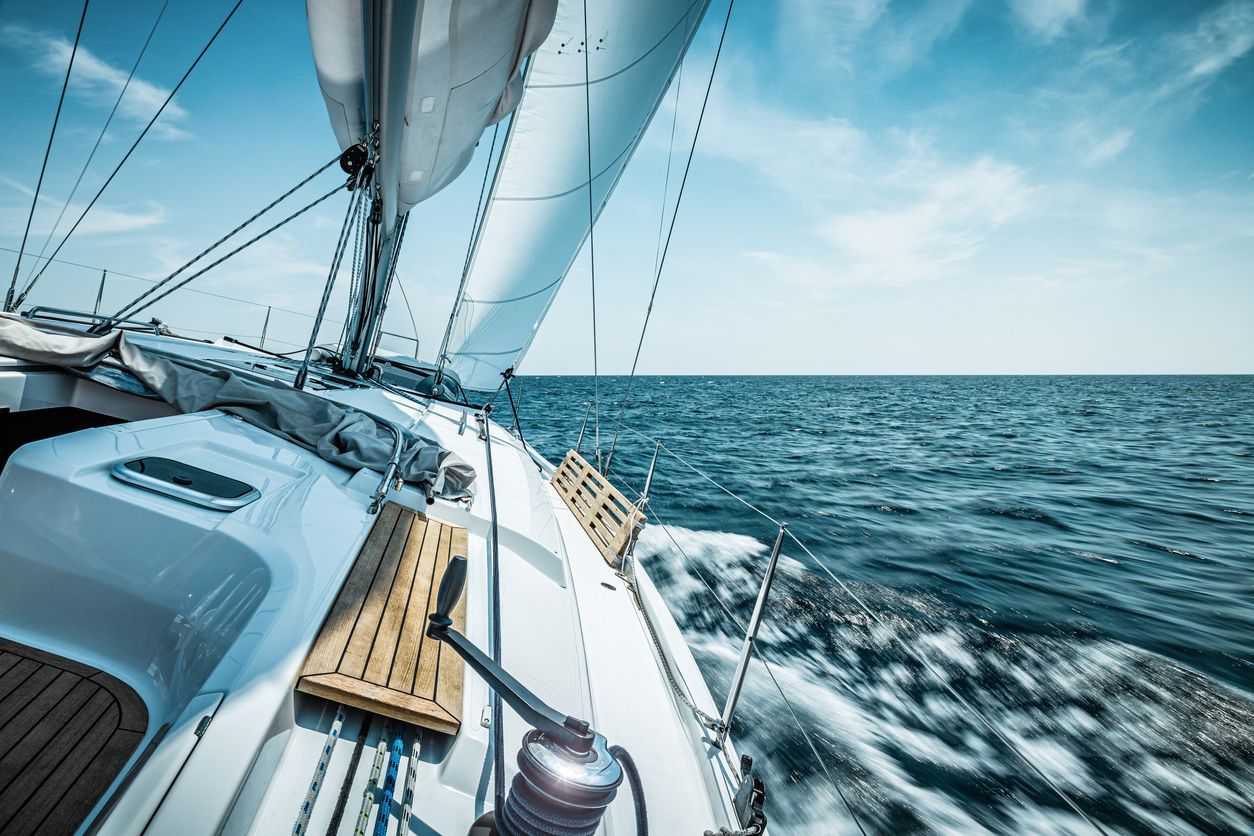 Sailing with sailboat. Long exposure.