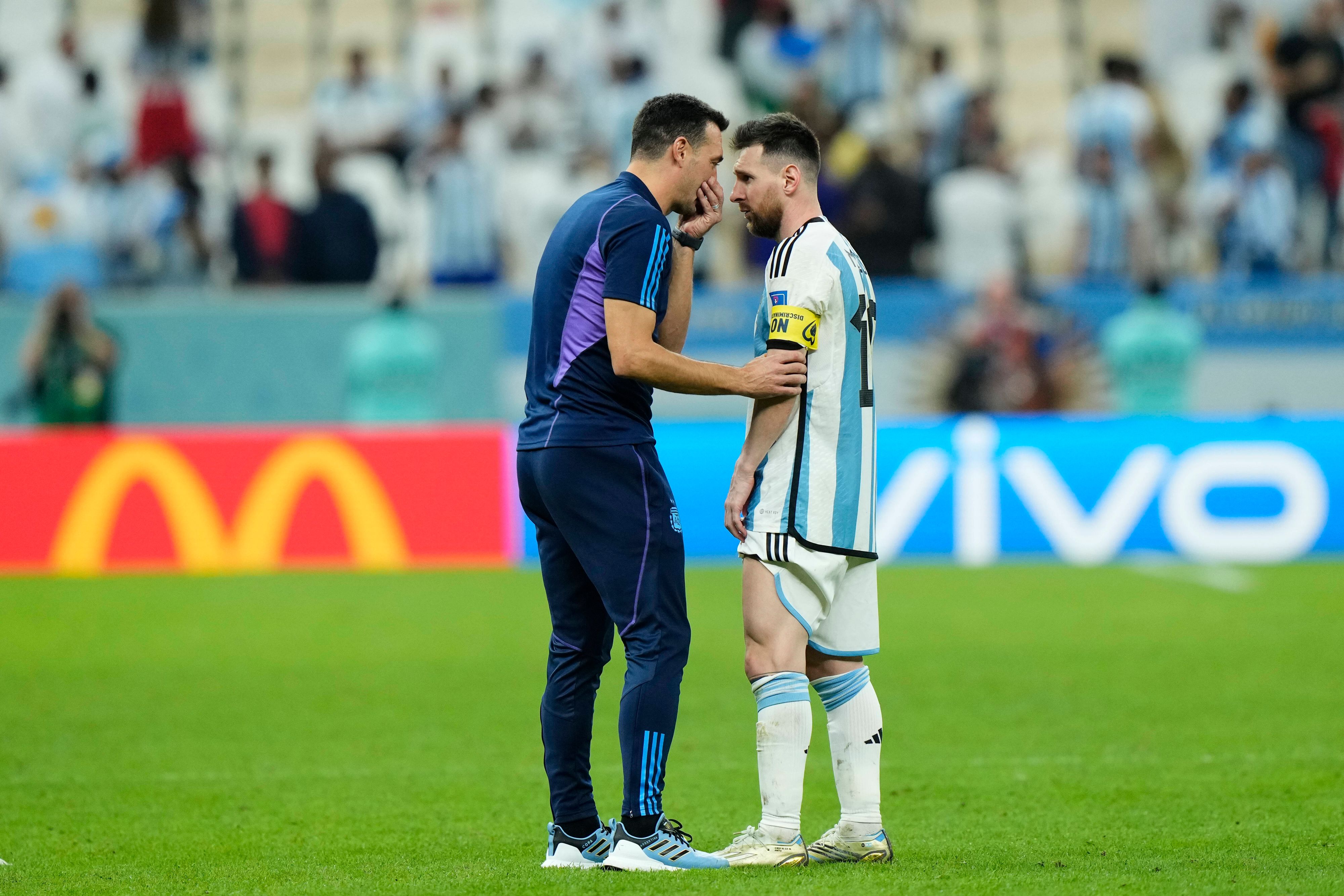 Netherlands v Argentina: Quarter Final - FIFA World Cup, WM, Weltmeisterschaft, Fussball Qatar 2022 Lionel Scaloni head coach of Argentina and Lionel Messi right winger of Argentina and Paris Saint-Germain celebrate victory after the FIFA World Cup Qatar 2022 quarter final match between Netherlands and Argentina at Lusail Stadium on December 9, 2022 in Lusail City, Qatar. Lusail City Qatar PUBLICATIONxNOTxINxFRA Copyright: xJosexBretonx originalFilename:breton-netherla221210_npoxU.jpg 