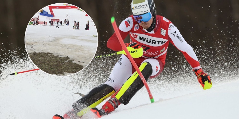 Manuel Feller in Garmisch, unter dem Schnee blitzt Gras durch.