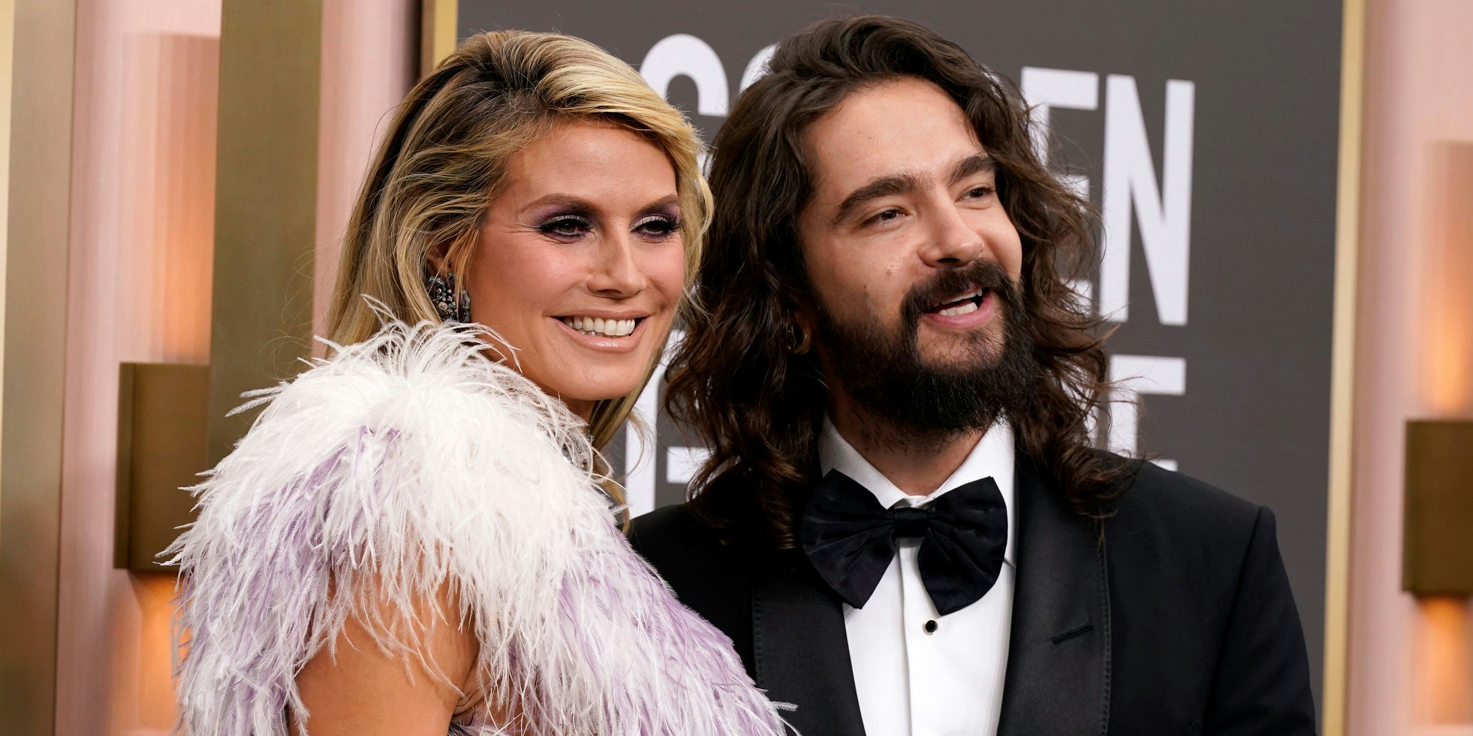 Download von www.picturedesk.com am 11.01.2023 (10:53).  Heidi Klum, left, and Tom Kaulitz arrive at the 80th annual Golden Globe Awards at the Beverly Hilton Hotel on Tuesday, Jan. 10, 2023, in Beverly Hills, Calif. (Photo by Jordan Strauss/Invision/AP) - 20230110_PD11096 - Rechteinfo: Rights Managed (RM)