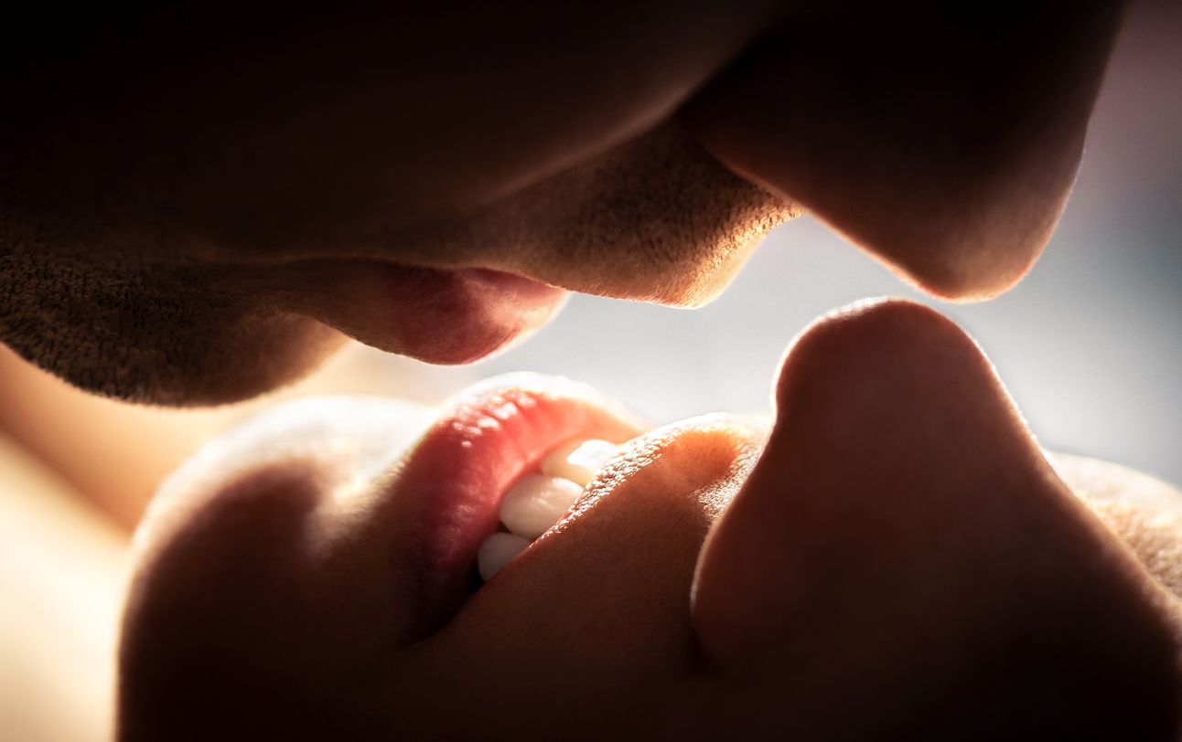 Couple kissing. Close up of lips. Romantic love, passionate temptation and chemistry.