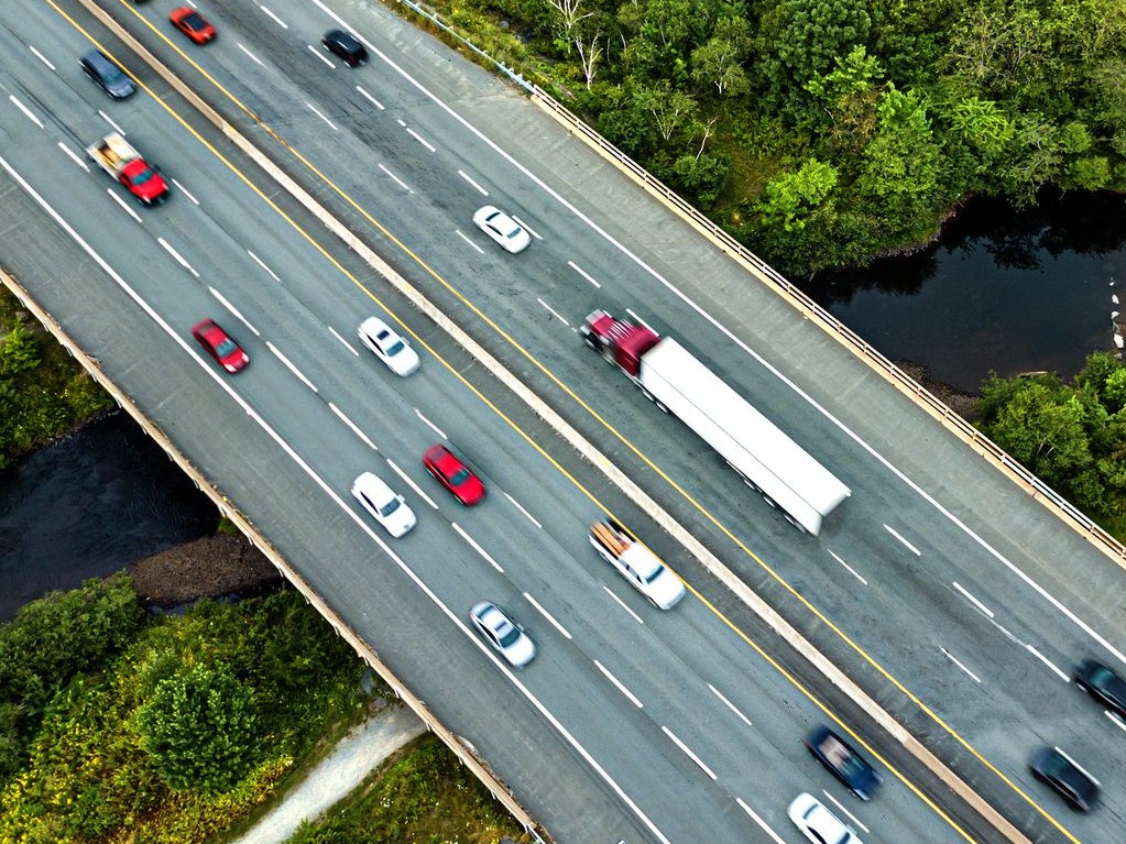Aerial view of a four lane highway.