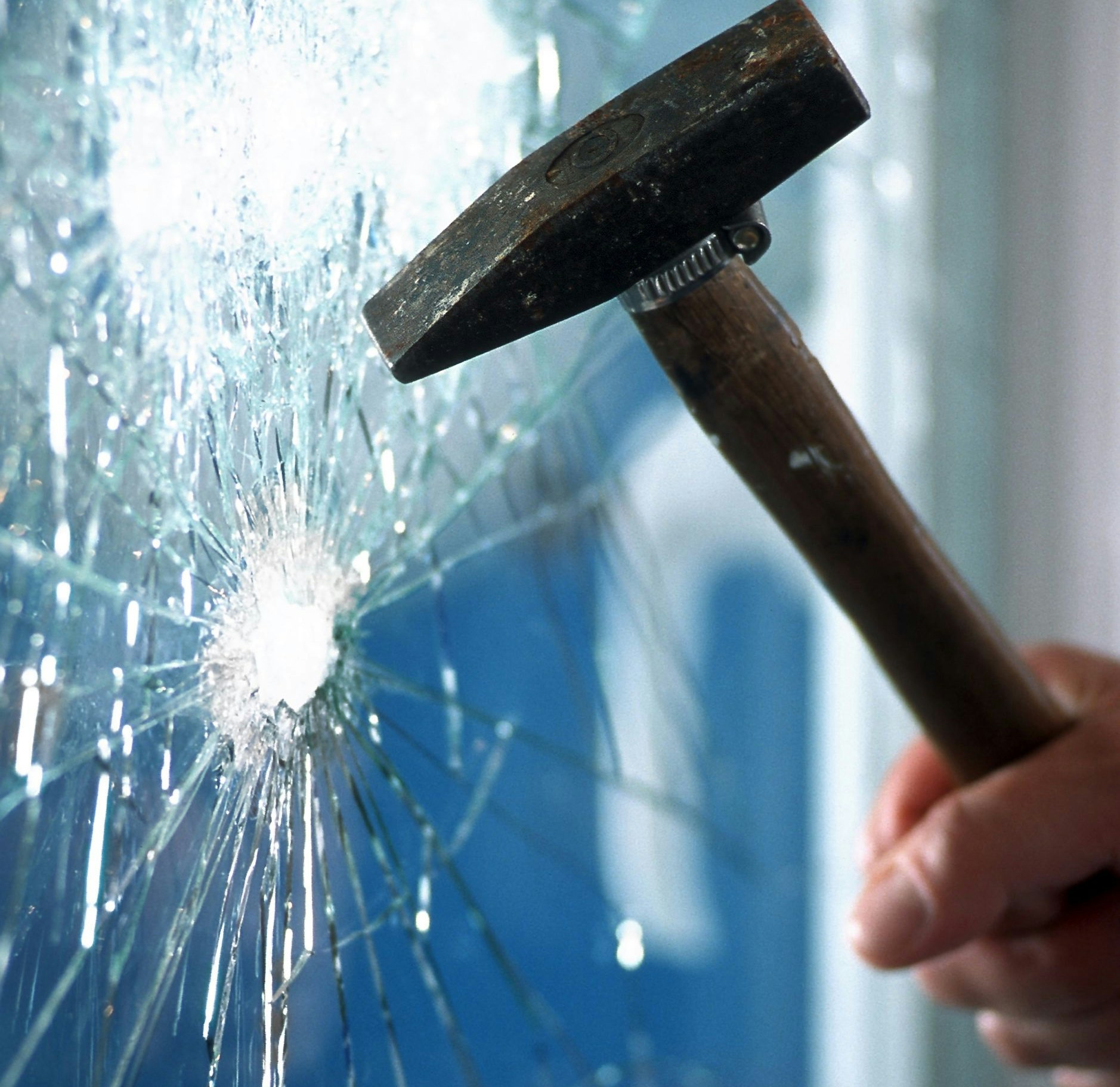 A hammer smashed a window panePlease also have a look at my private lightbox Security