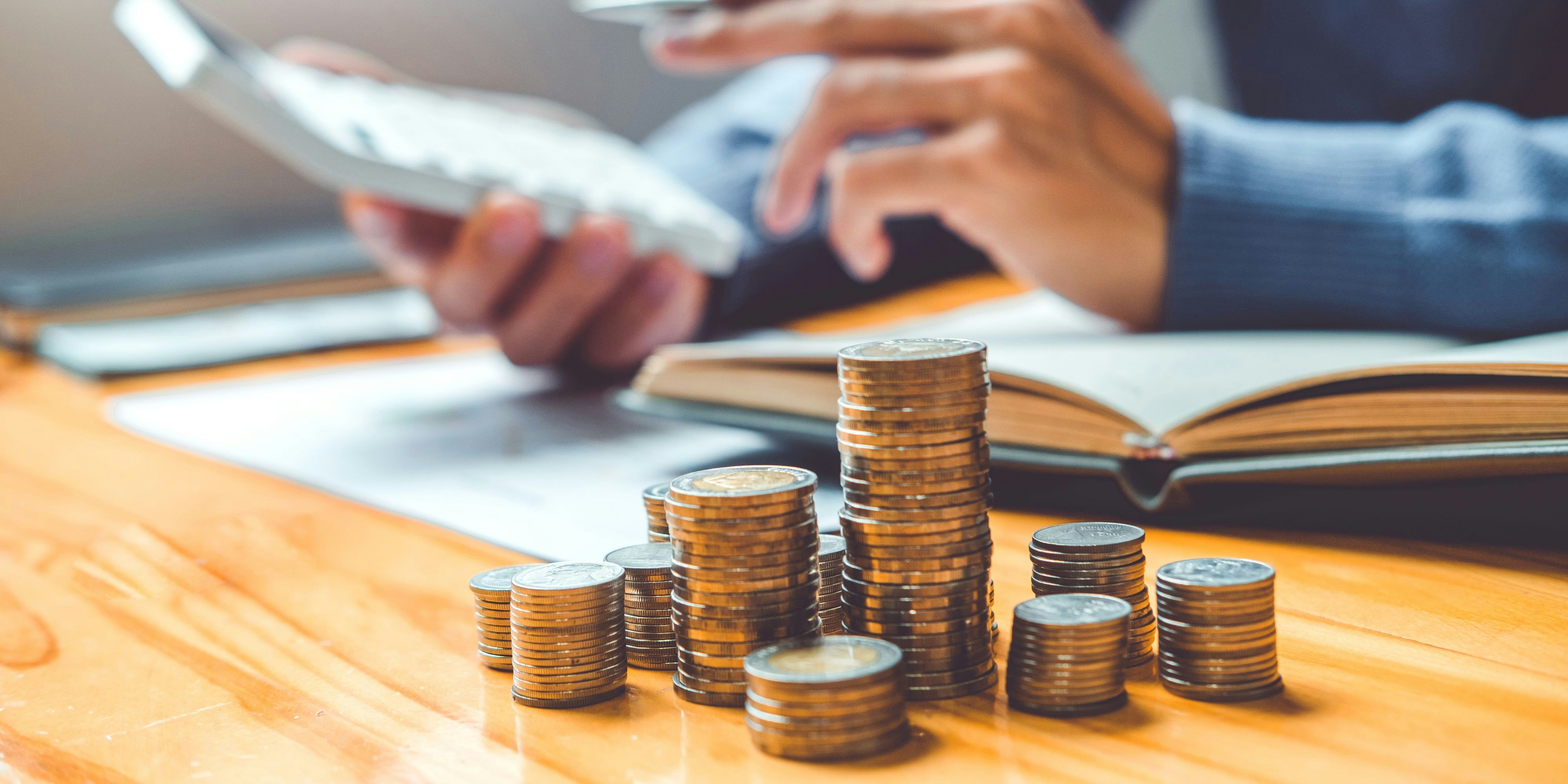 Saving money concept Man hand putting Row and coin Write Finance Saving money concept Man hand putting Row and coin Write Finance