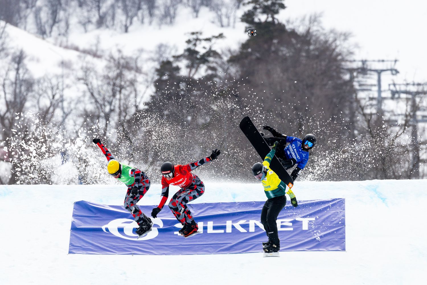 Action im Snowboard Cross