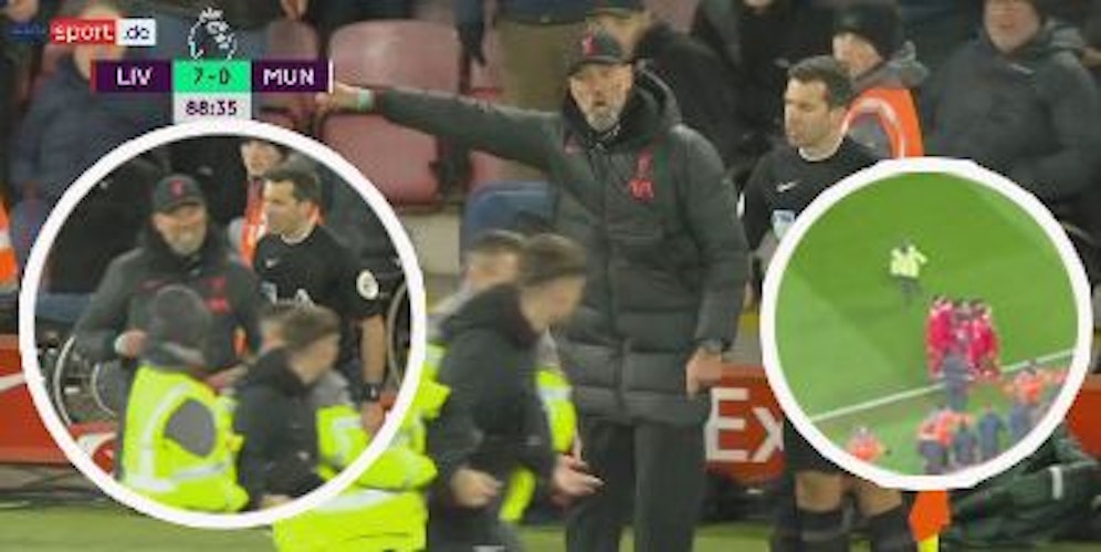 Jürgen Klopp attackiert den Flitzer, der seine Spieler gefährdete.