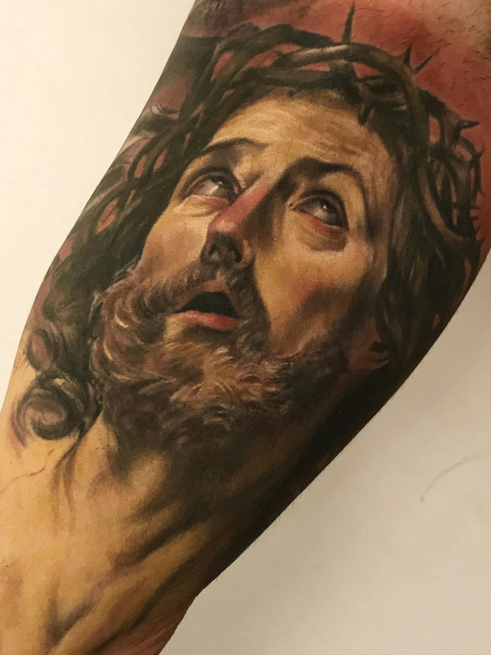 Jesus im Blick: Tattoo von Damiano Lucidi "Passion of Jesus"