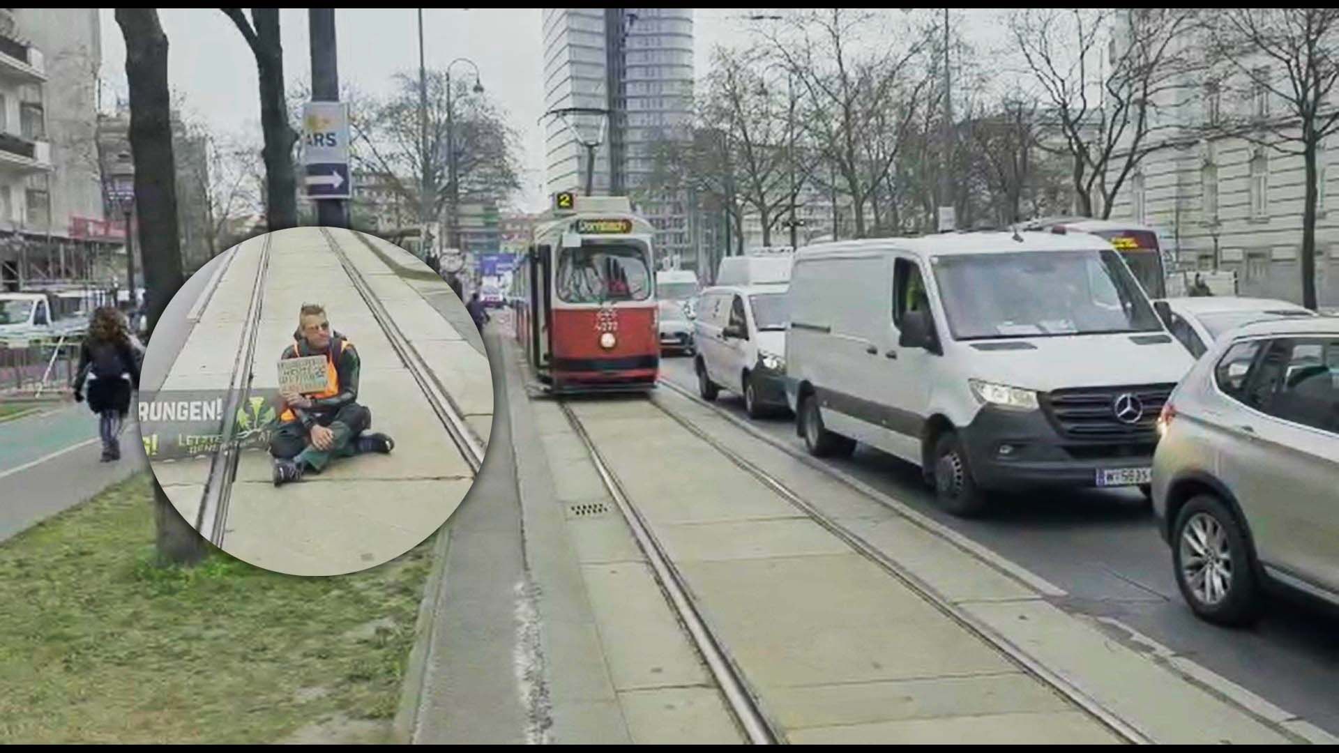 Einer der Aktivisten blockierte am Mittwoch auch die Bim-Gleise am Ring.