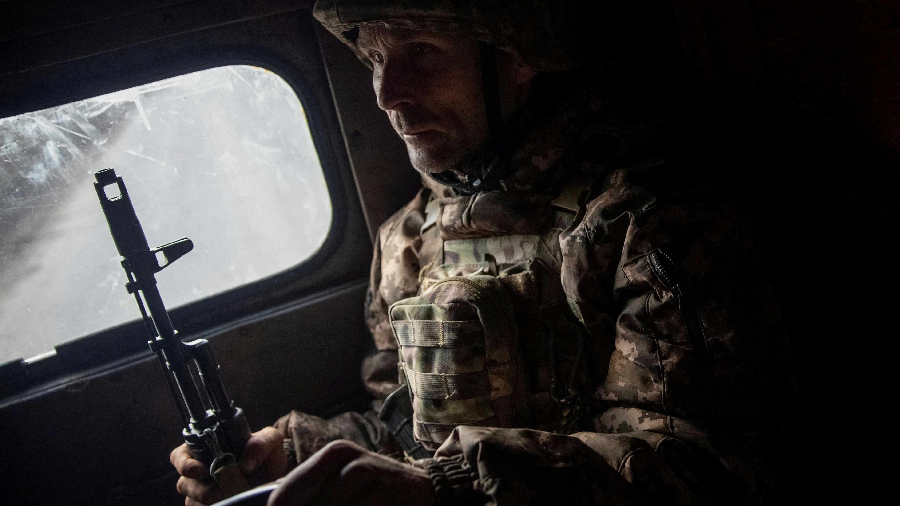 A Ukrainian service member rides a military vehicle, as Russia's attack on Ukraine continues, in the front line city of Bakhmut, Ukraine March 3, 2023. REUTERS/Oleksandr Ratushniak     TPX IMAGES OF THE DAY     