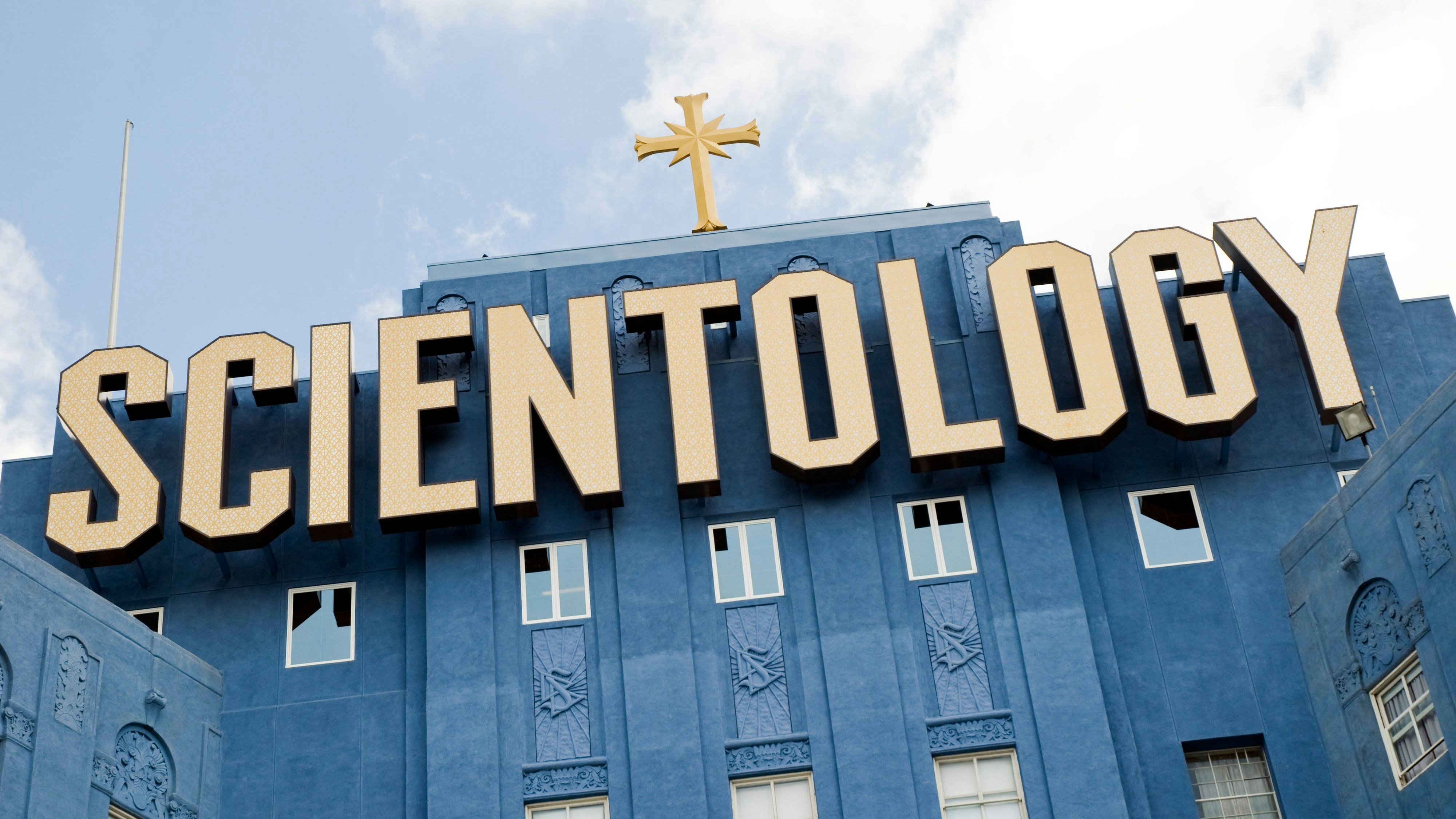 Hollywood, California, USA - May 9, 2011: On Fountain Ave, Scientology sign and cross on the top of a Scientology headquarter.