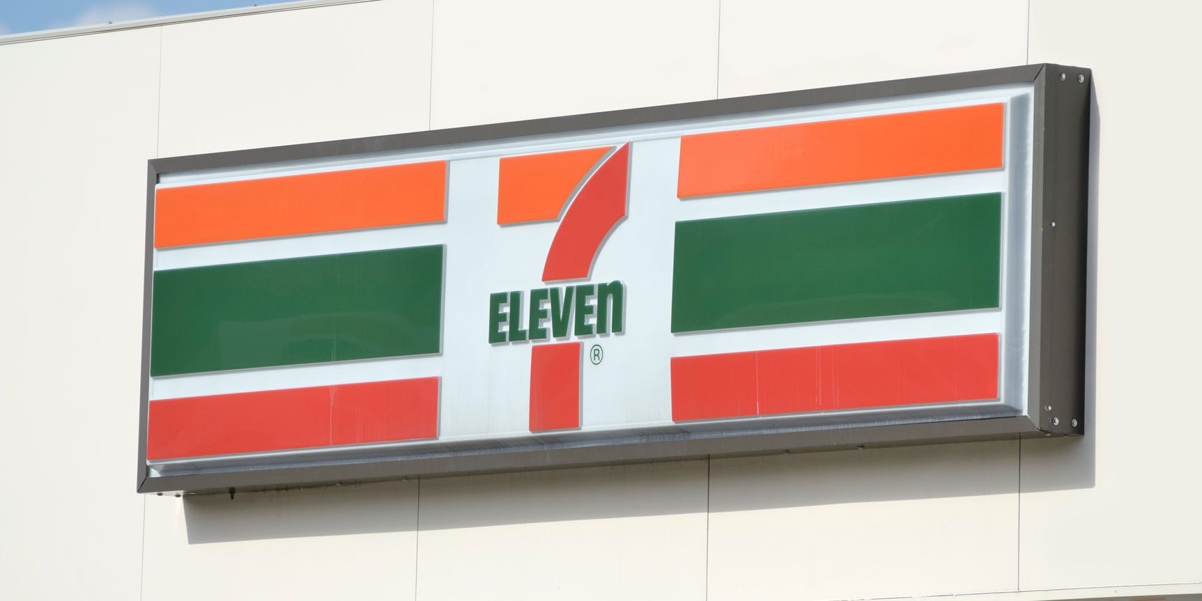 Rochester, Michigan, USA - September 22, 2011: The 7-Eleven convenience store on Main Street in downtown Rochester, Michigan. 7-Eleven is the world's largest chain of convenience stores. Headquartered in Japan, there are currently a total of 39,000 locations worldwide.
